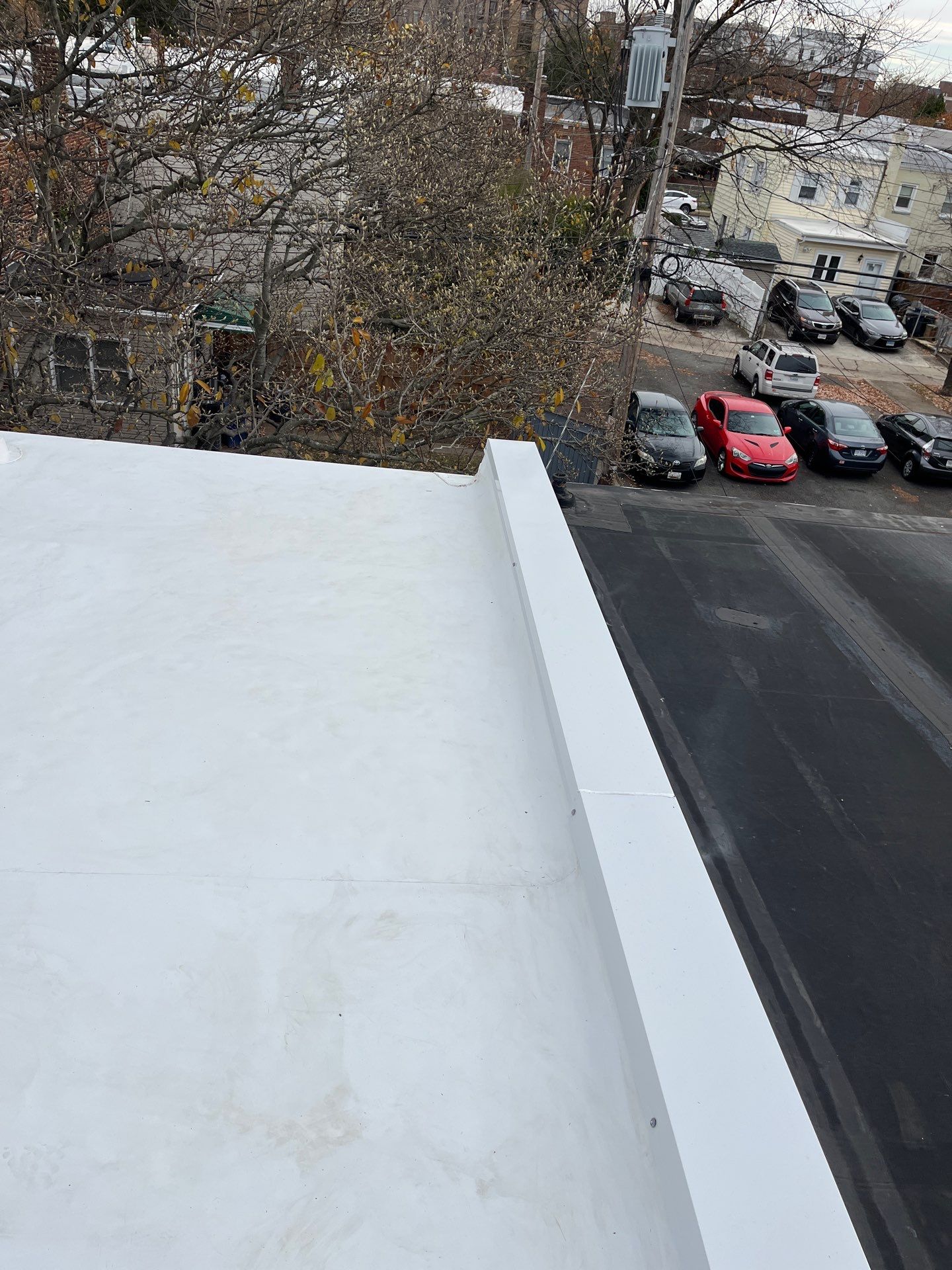 Alexandria: Residential Flat Roof Replacement with Mule Hide TPO Membrane by RM Banning, Inc.