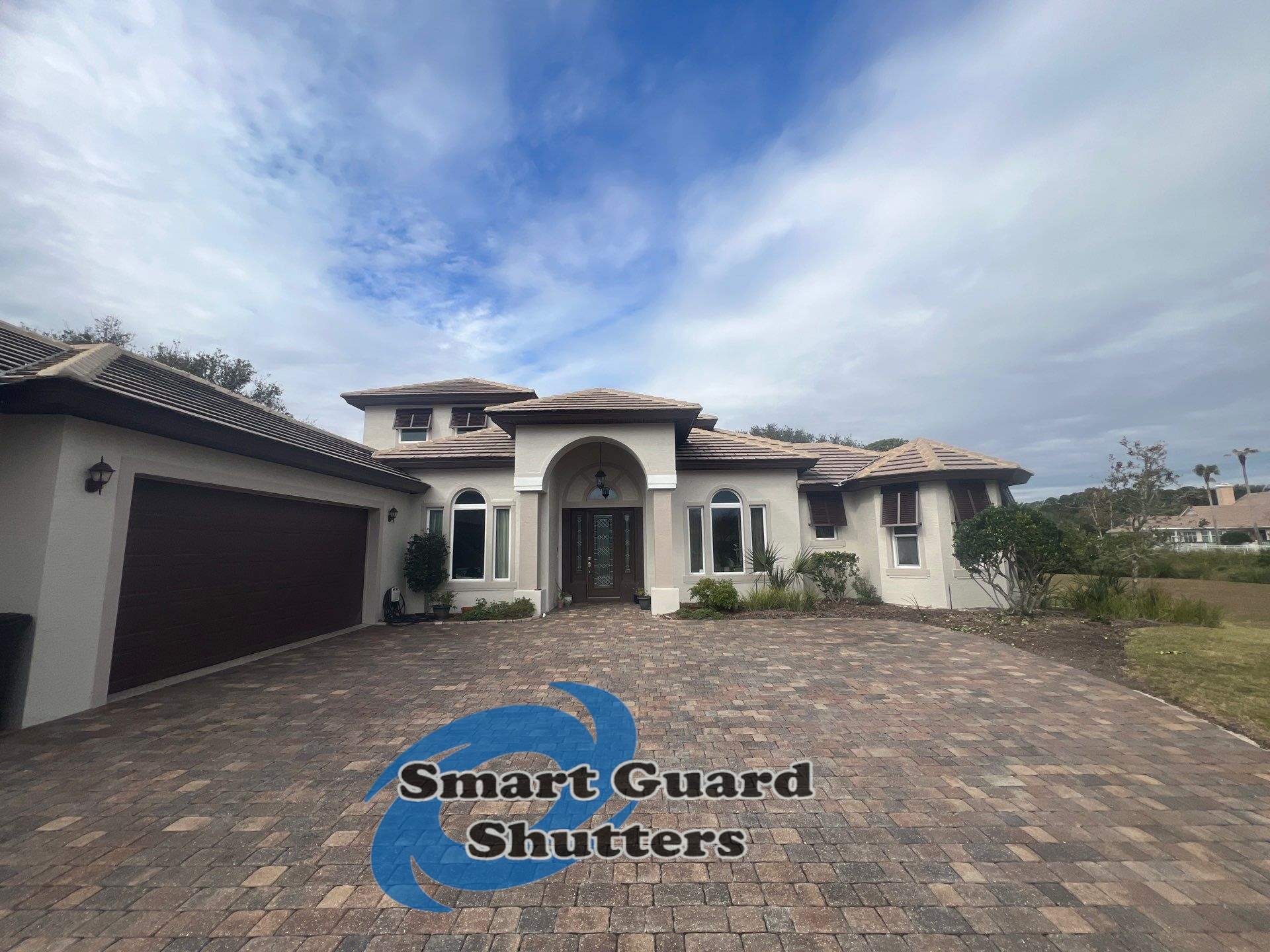 Decorative Bahama Shutters in Chocolate Brown by Smart Guard Shutters