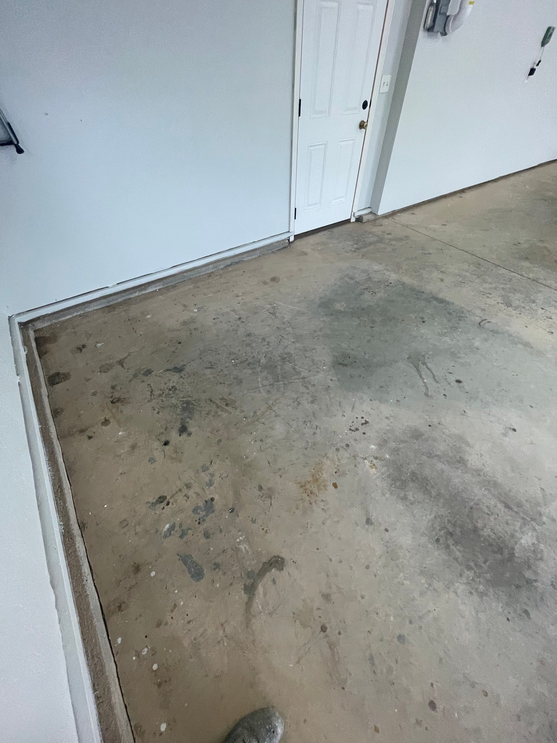 Multi-Car Garage Floor Coating and Crack Repair in Tea by Select Painting, Coatings & Garage Cabinets