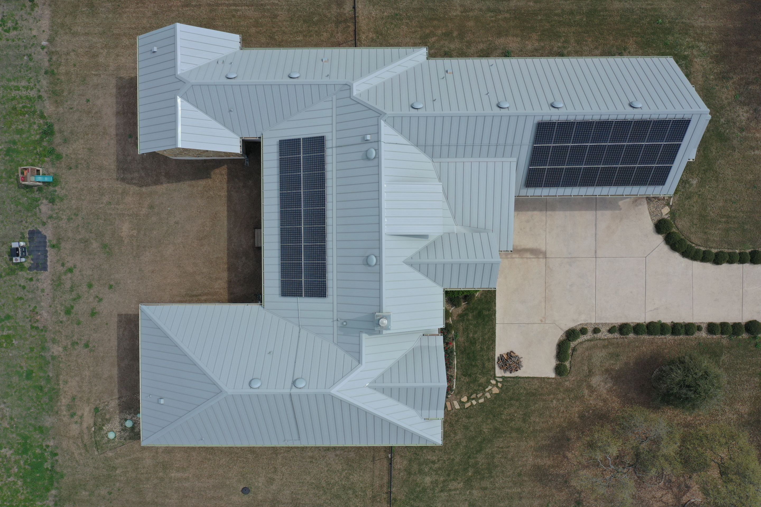 Residential Roof Replacement using 24 GA Double-Lock - Galvalume by Action Exteriors Austin