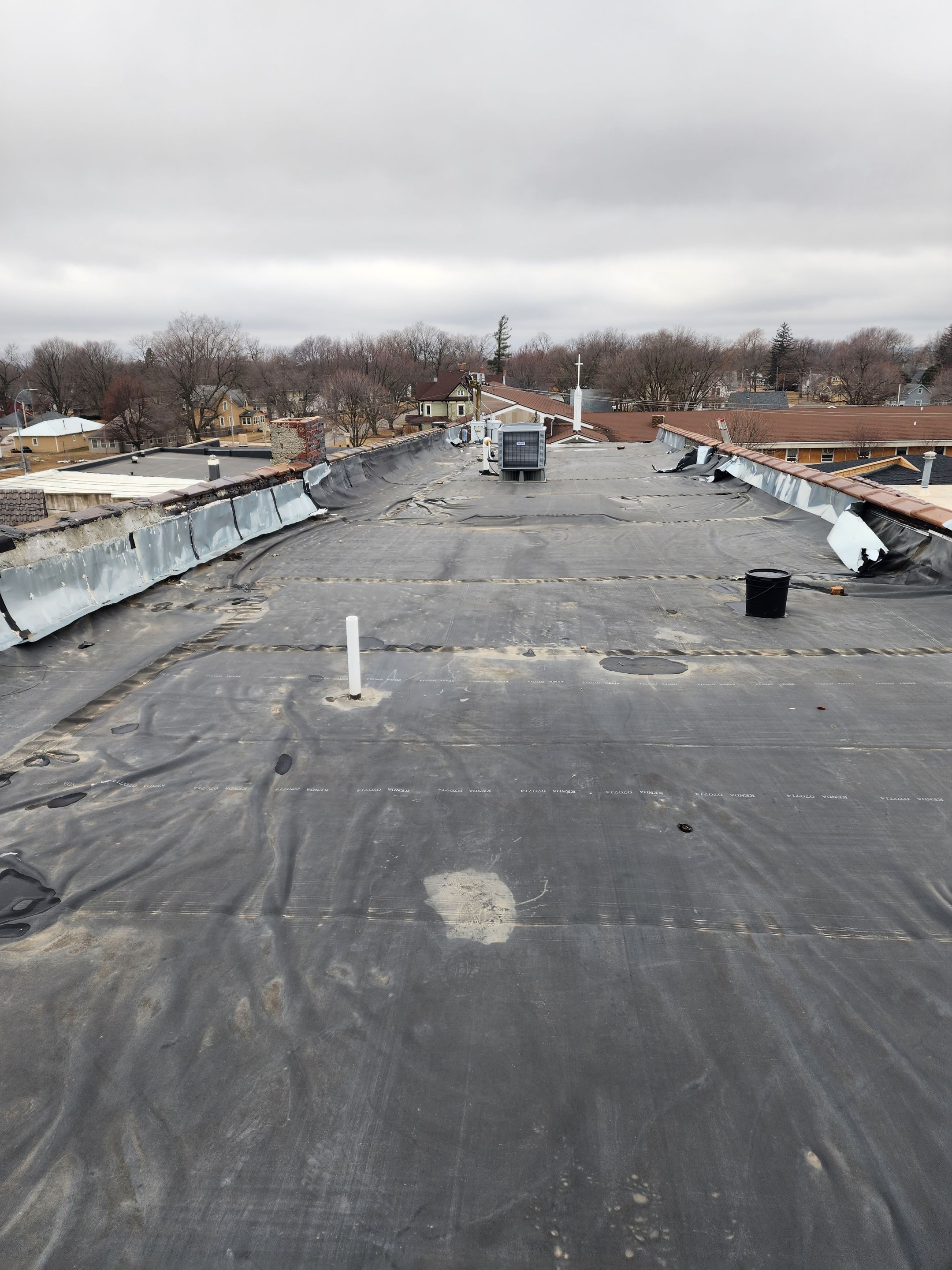 Roof Recover on a downtown building in Lake City  by Grell Roofing, LLC