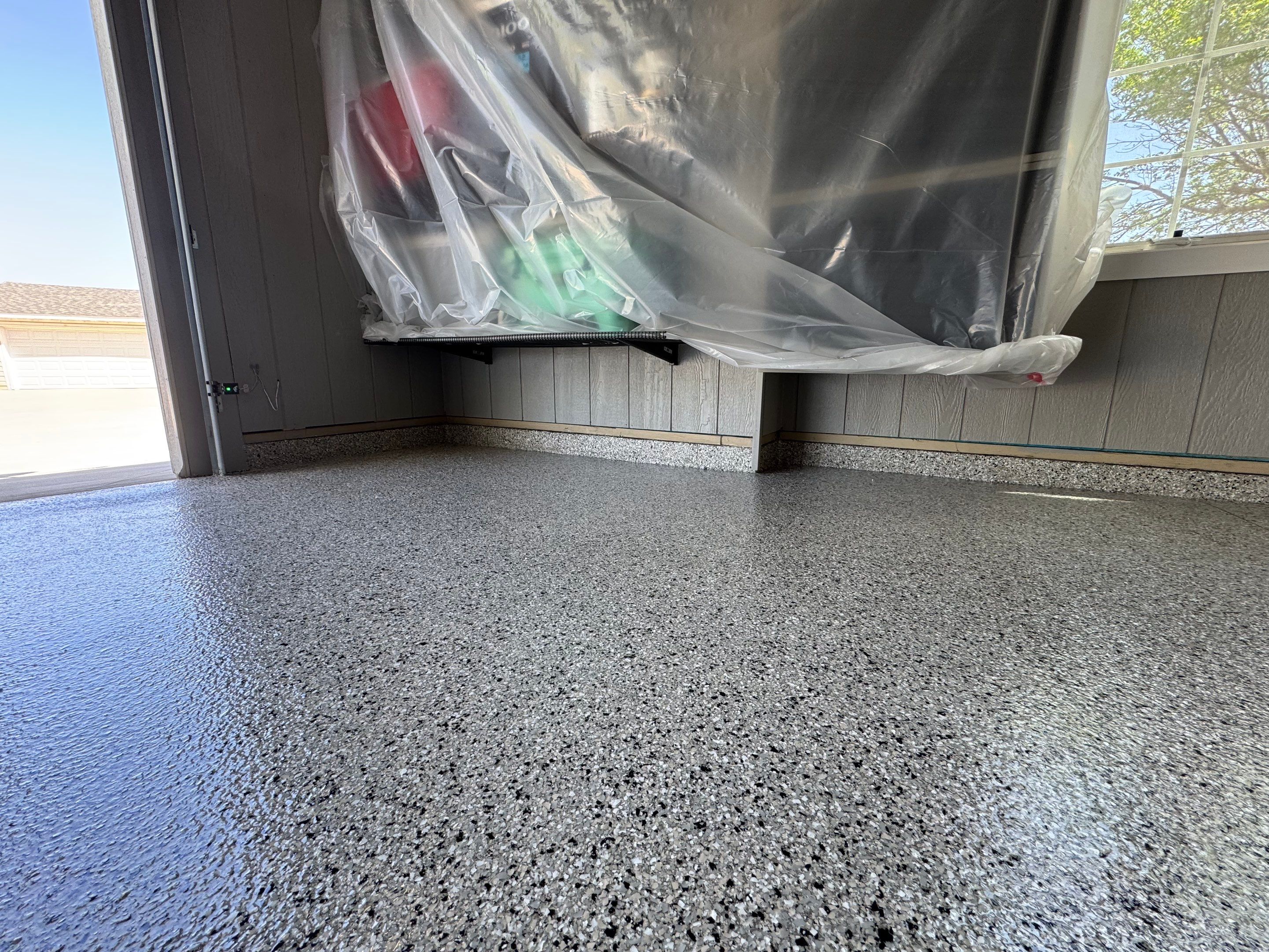 High-Gloss Grey Epoxy Floor Coating for Inwood Garage by Select Painting, Coatings & Garage Cabinets
