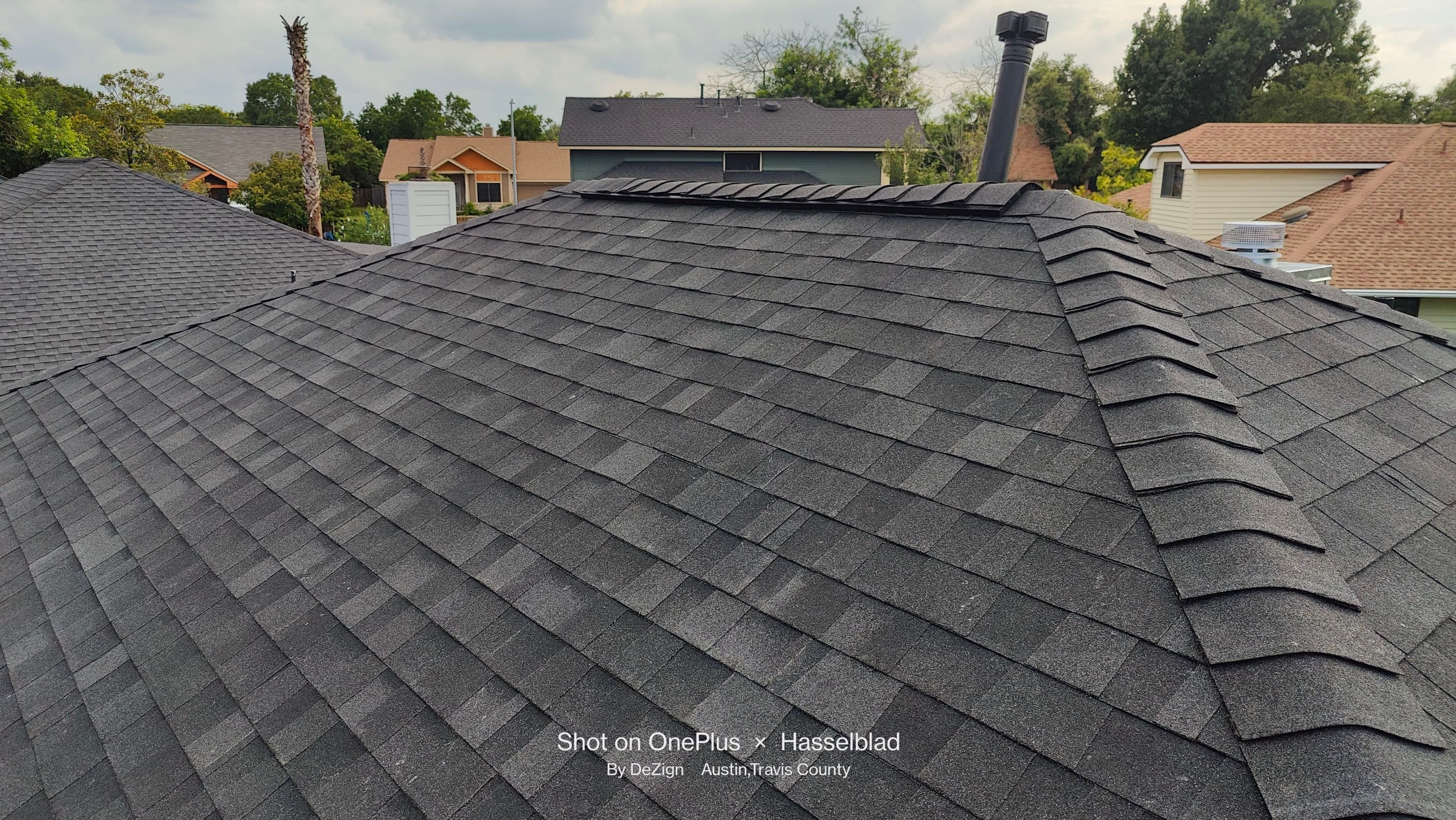 Residential Roofing Installation using Owens Corning Oakridge Onyx Black by DeZign Roofing & Exteriors