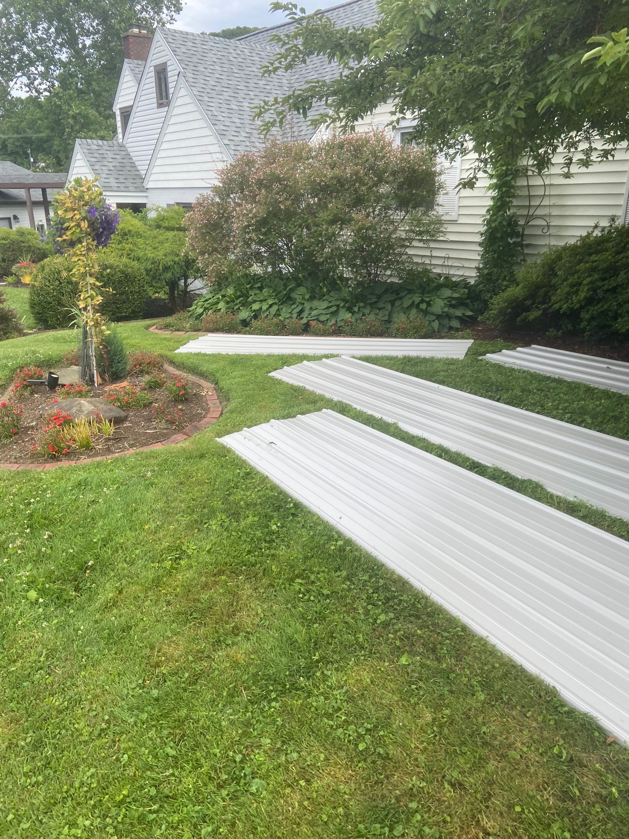 Metal Roofing, Skylights, Porch Build by Secure Construction Company Inc