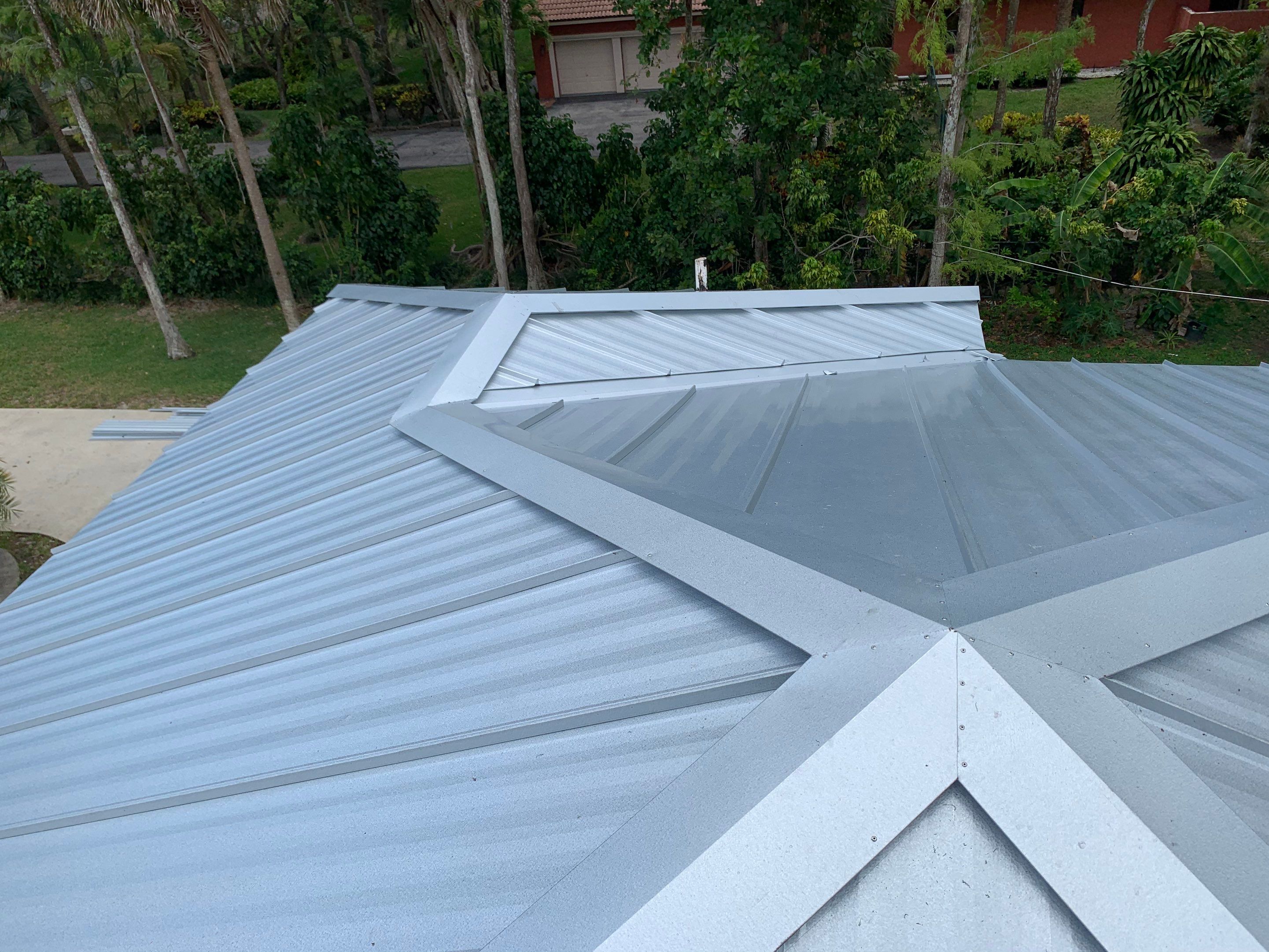 Residential Roofing Installation using 1" Nail strip metal roof by BLUES BROTHERS CONSTRUCTION CORP