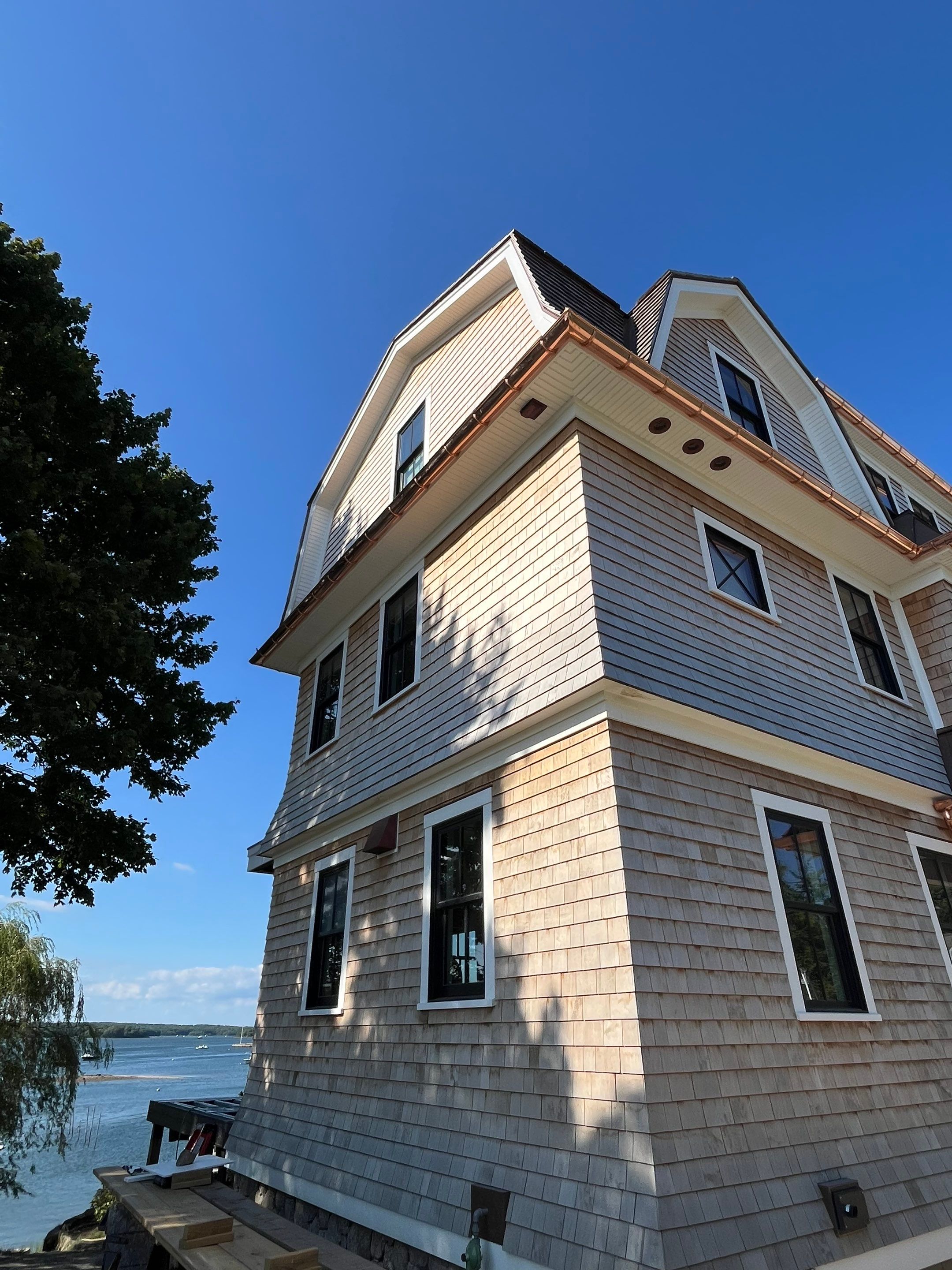Great Island - Red Cedar Roofing, Yellow Cedar Siding, Standing Seam Copper, & Copper Gutters by Rinaldi Brothers