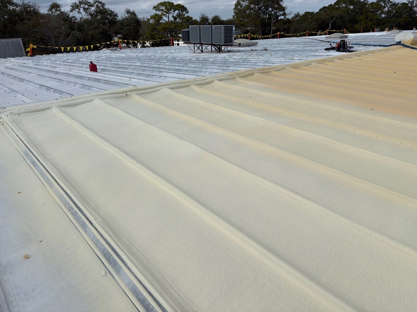 Sarasota Industrial Warehouse Metal Roof Silicone Coating Restoration by CES Roofing