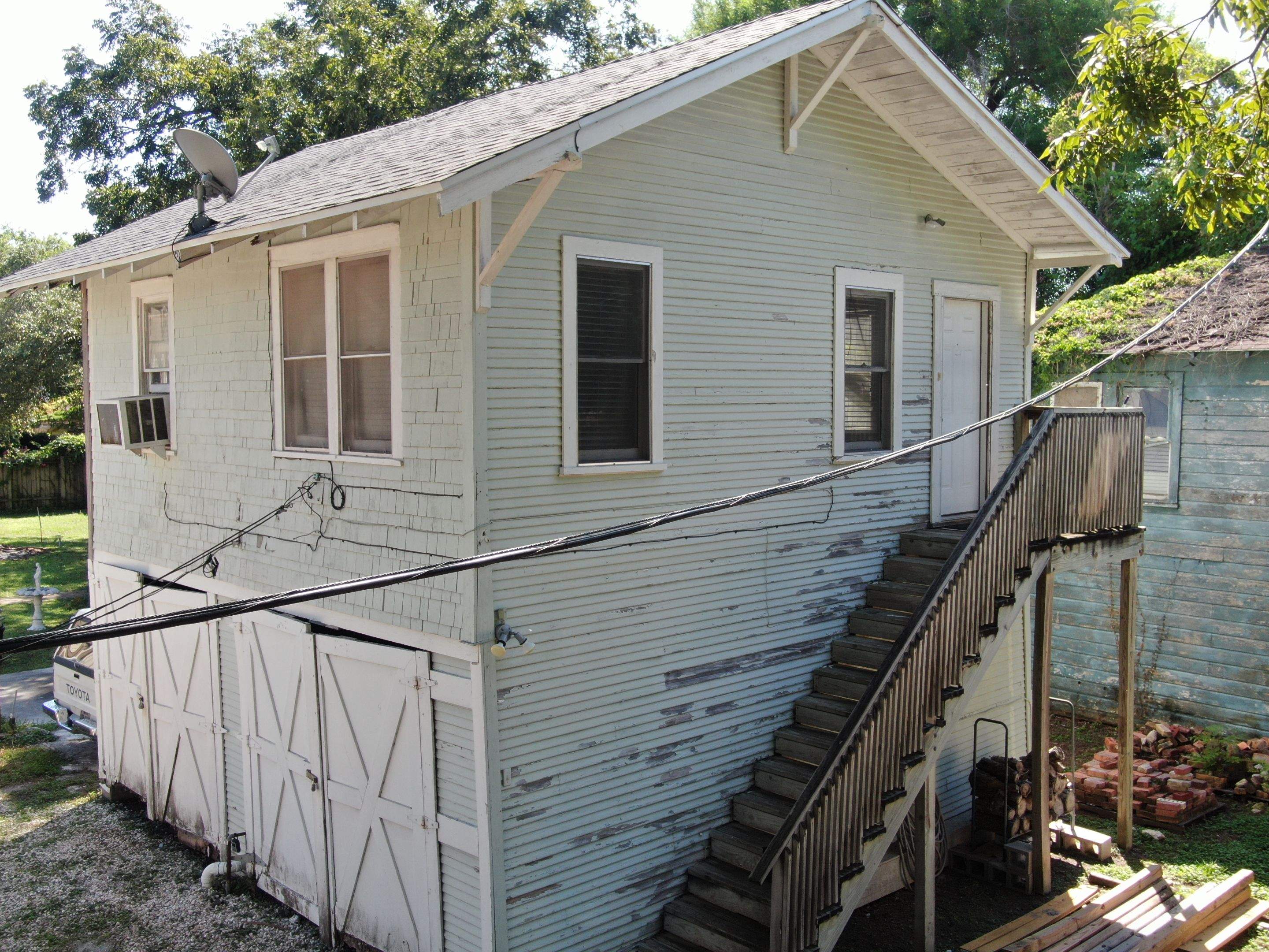 Up Town, Up Class by Bayfront Roofing and Construction
