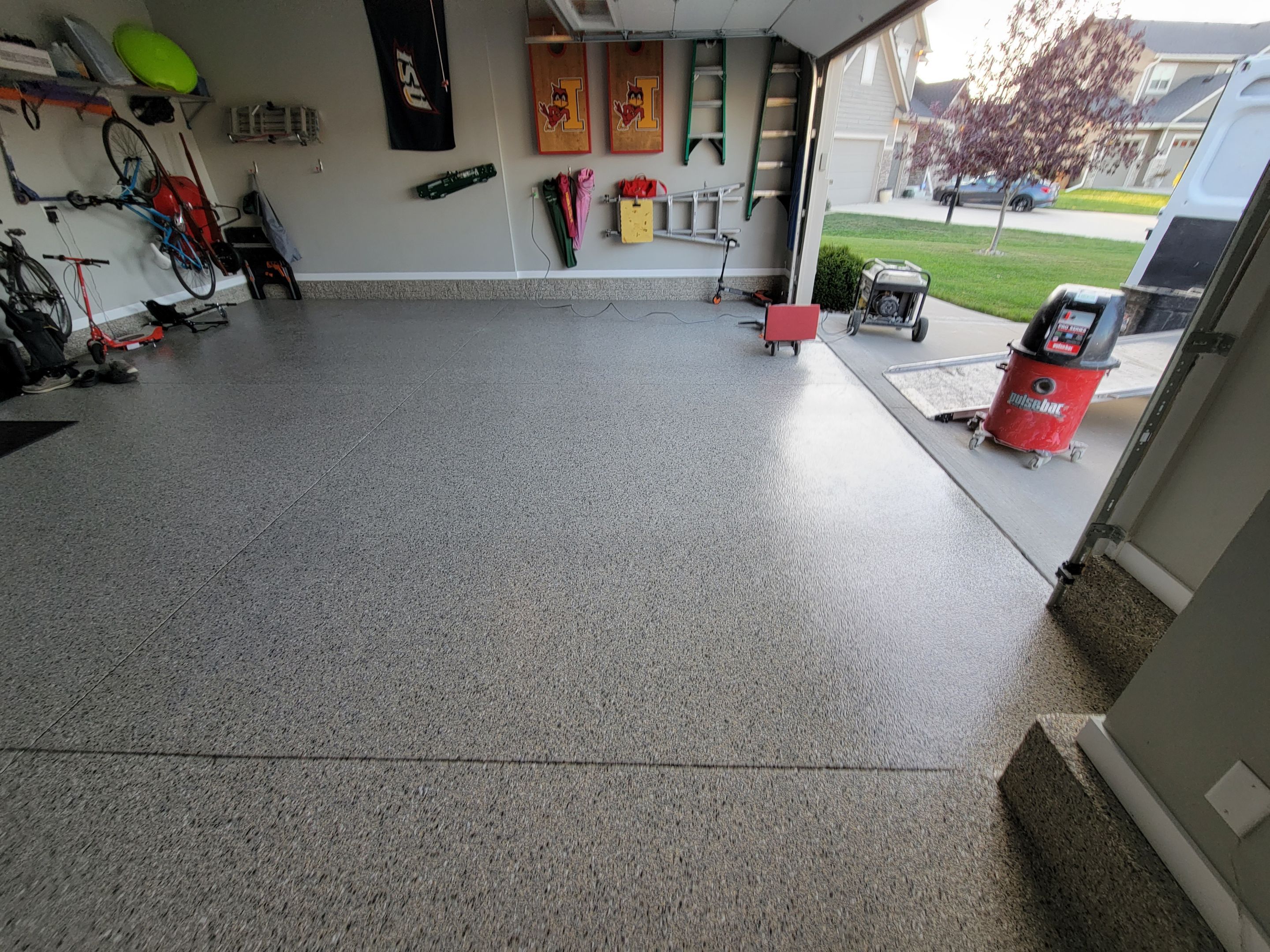 Grimes, IA Transformation: Professional Grade Garage Floor Coating by Revival Concrete Coatings