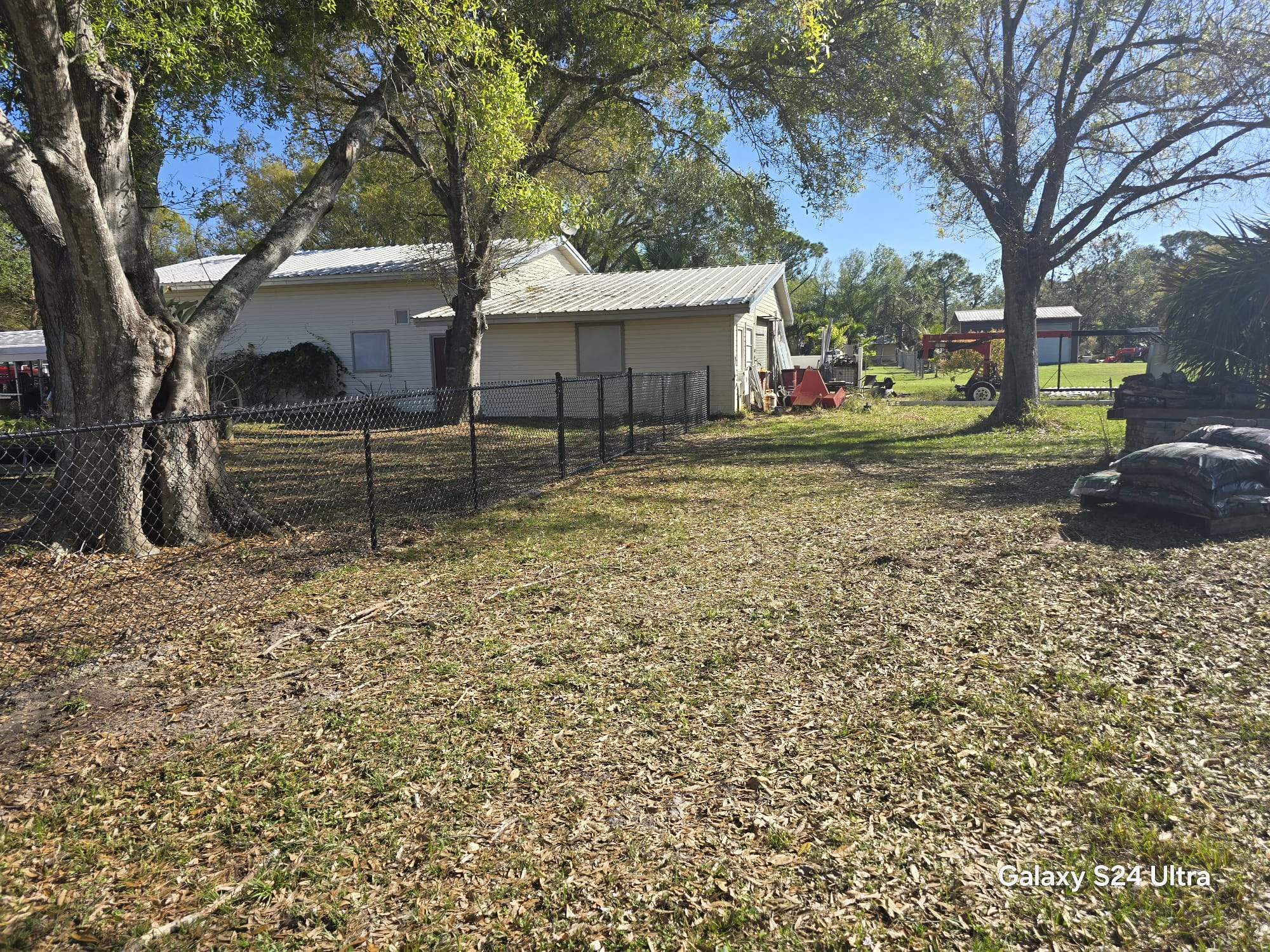 Black Chain Link Fence Installation in Port Charlotte by True Fence LLC