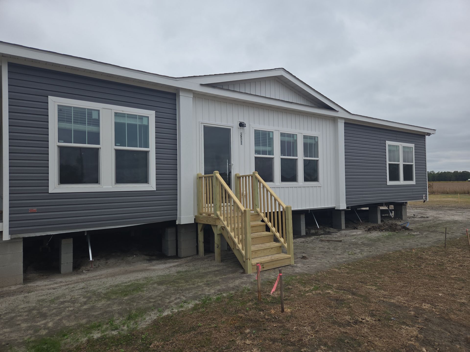 Custom Trex Covered Deck and Gabled Roof in Winterville by The Remodeling Company