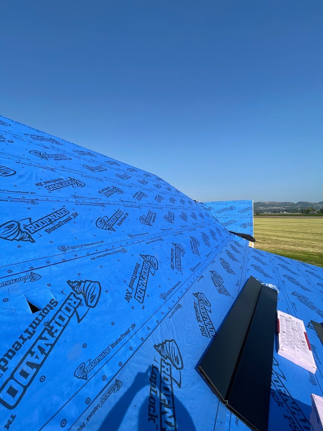 Residential Roofing Installation using OC Oakridge shingles by Top Notch Roofing Inc