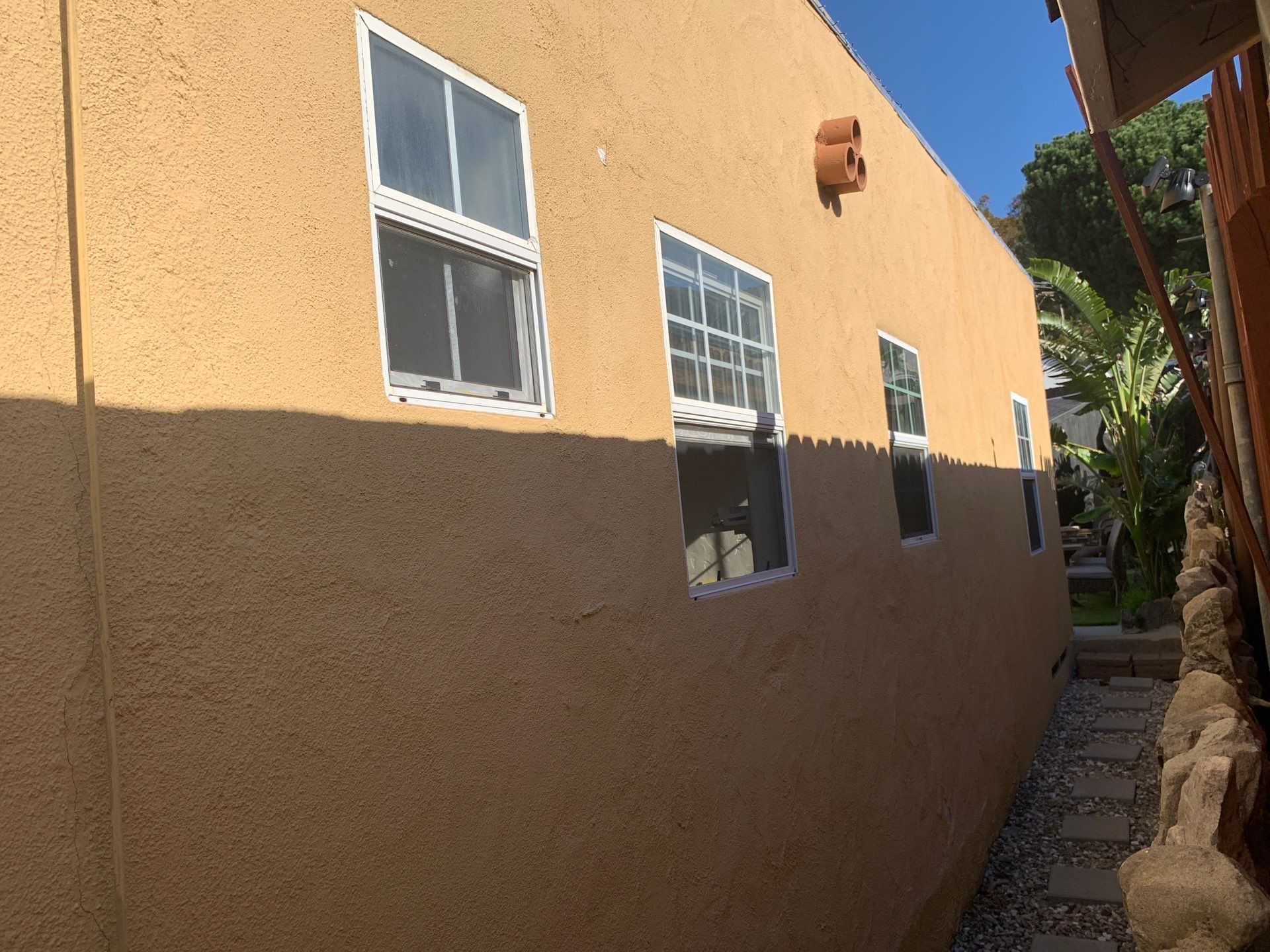 Window Installation using Black Anlin windows by American Window Company