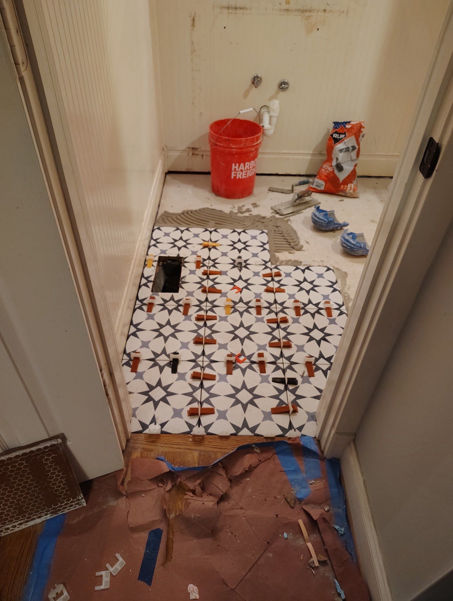 Tile shower and floor by Footprints Floors of Nashville