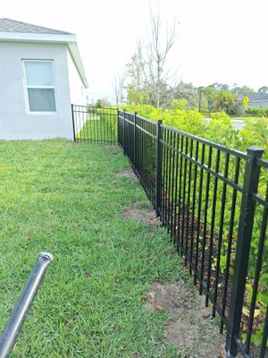 Aluminum Fence Installation using Black 3 Rail Aluminum Fence