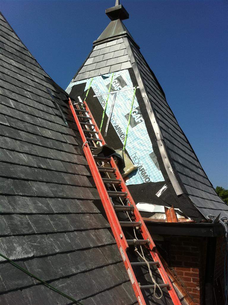Historic Building ROOF REPLACEMNT with GAF TruSlate  on steep slop and Versico 60mil TPO on flat roof by Gorilla Exteriors Contracting, LLC