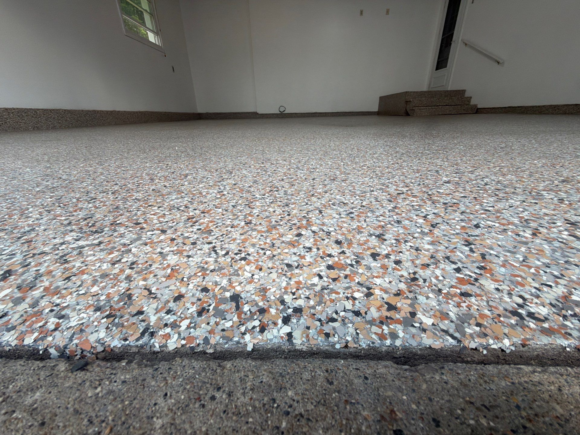 Multi-Colored Epoxy Flake Garage Floor Installation in Fruitport by Gordon Painting