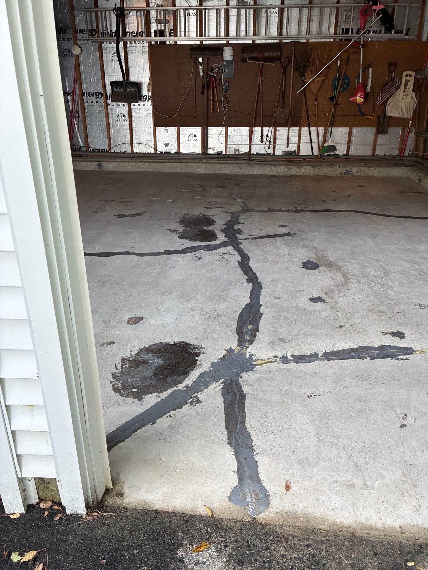 Concrete Floor Coating Using Feather Gray Color by DiGiorgi Roofing and Siding Inc