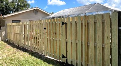 Wood Fence Installation using Shadowbox Wood Fence