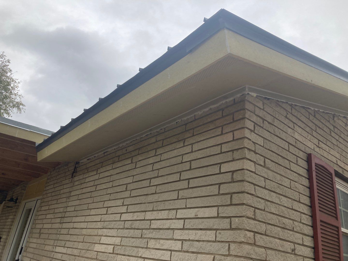 Beeville Backporch sittin' by Bayfront Roofing and Construction