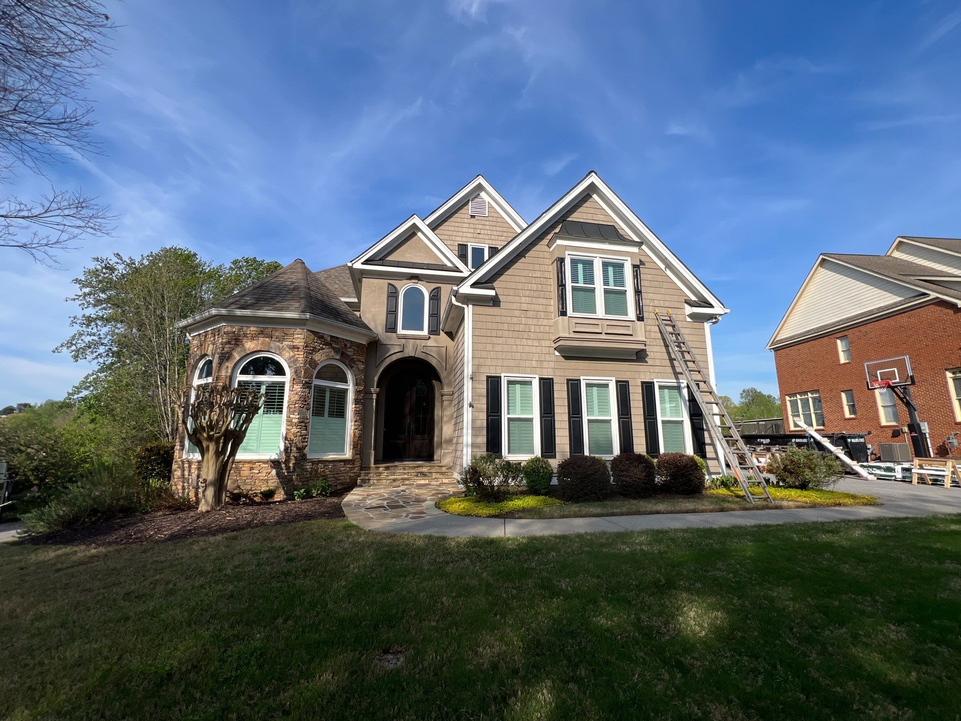 Full Exterior Siding Replacement and Stone Veneer Installation in Roswell by Swift Home Renovations