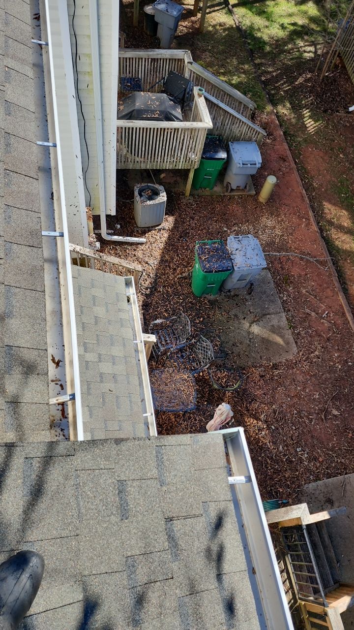 Gutter Cleaning using water by Power Wash Masters LLC