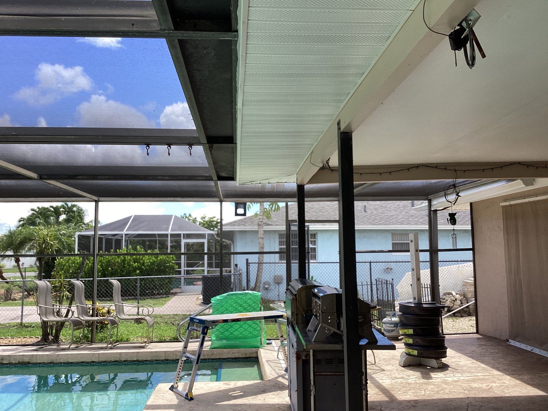 White Seamless Gutters and Splash Guards in Fort Myers FL by Gutter Professor by Gutter Professors