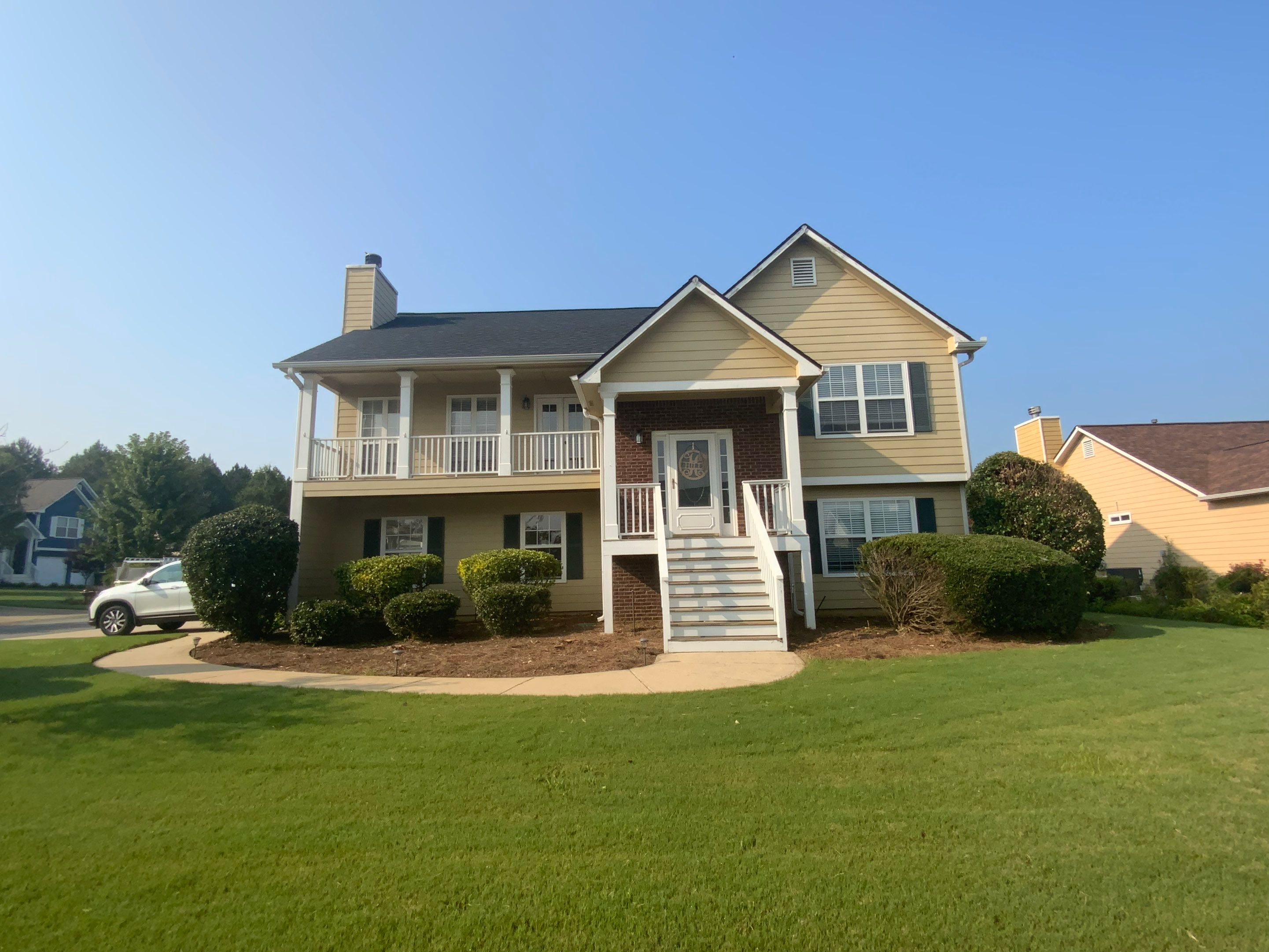 Comprehensive Exterior Painting for Cartersville Home with Blue Siding Transformation by Swift Home Renovations
