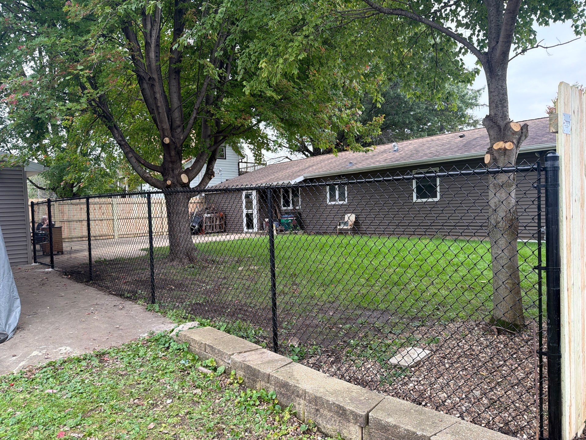 Custom Wood Privacy and Black Chain Link Fence in Hudson by Perfect Picket Fence and Stain