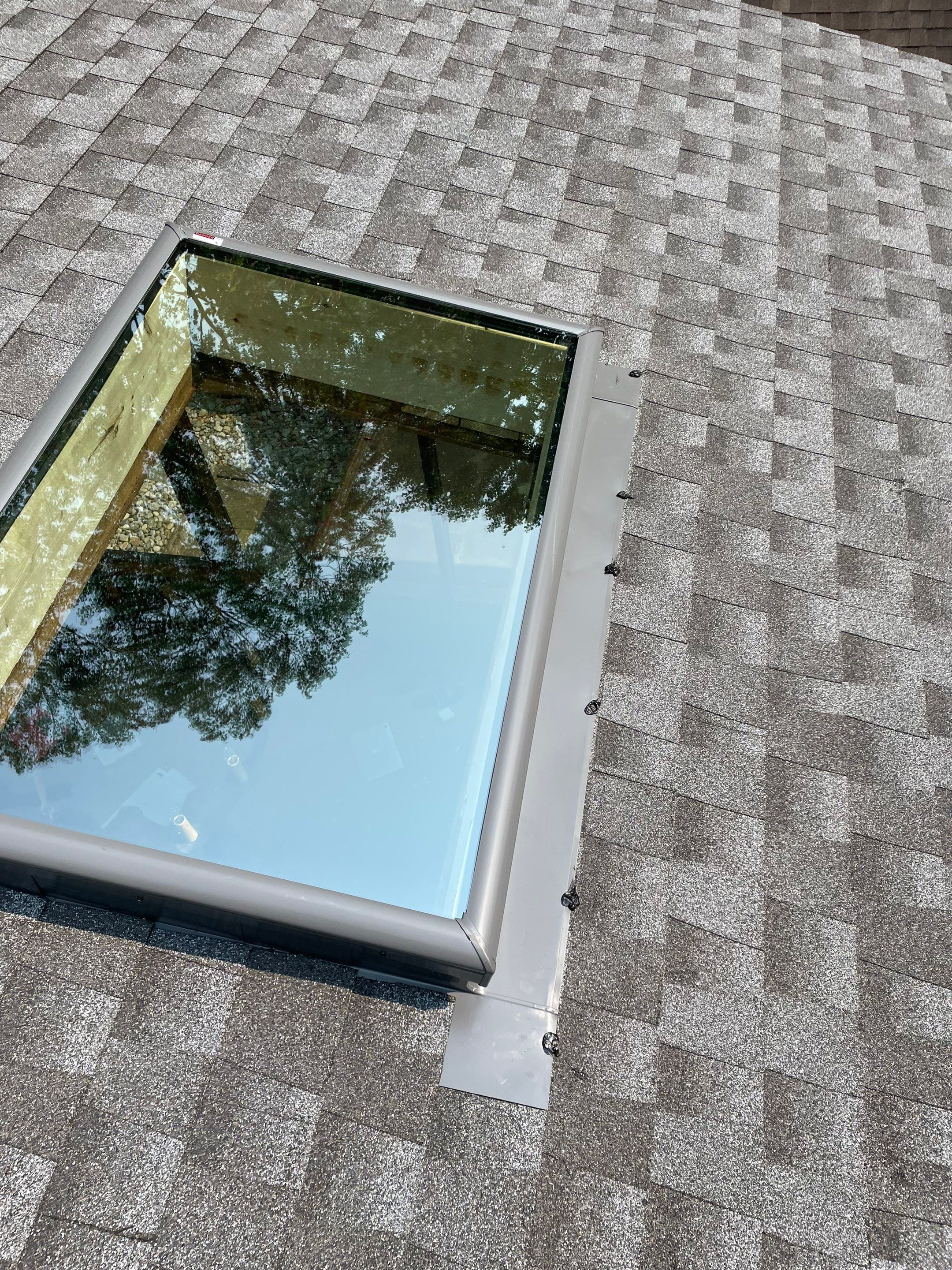 Deckhouse Roof Replacement by American Home Contractors
