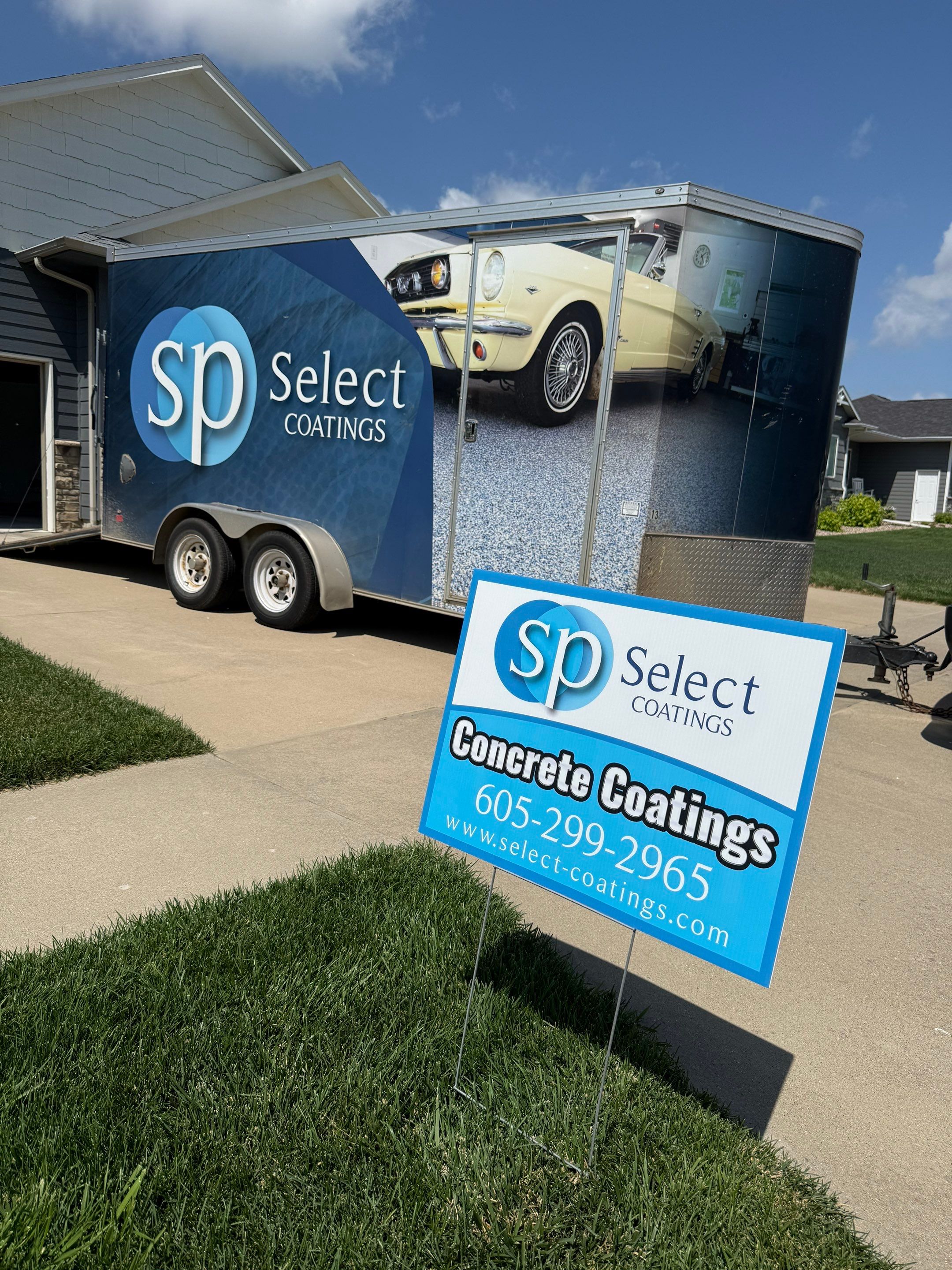 Sioux Falls Garage Concrete Coating Installation with Domino Flake by Select Painting, Coatings & Garage Cabinets