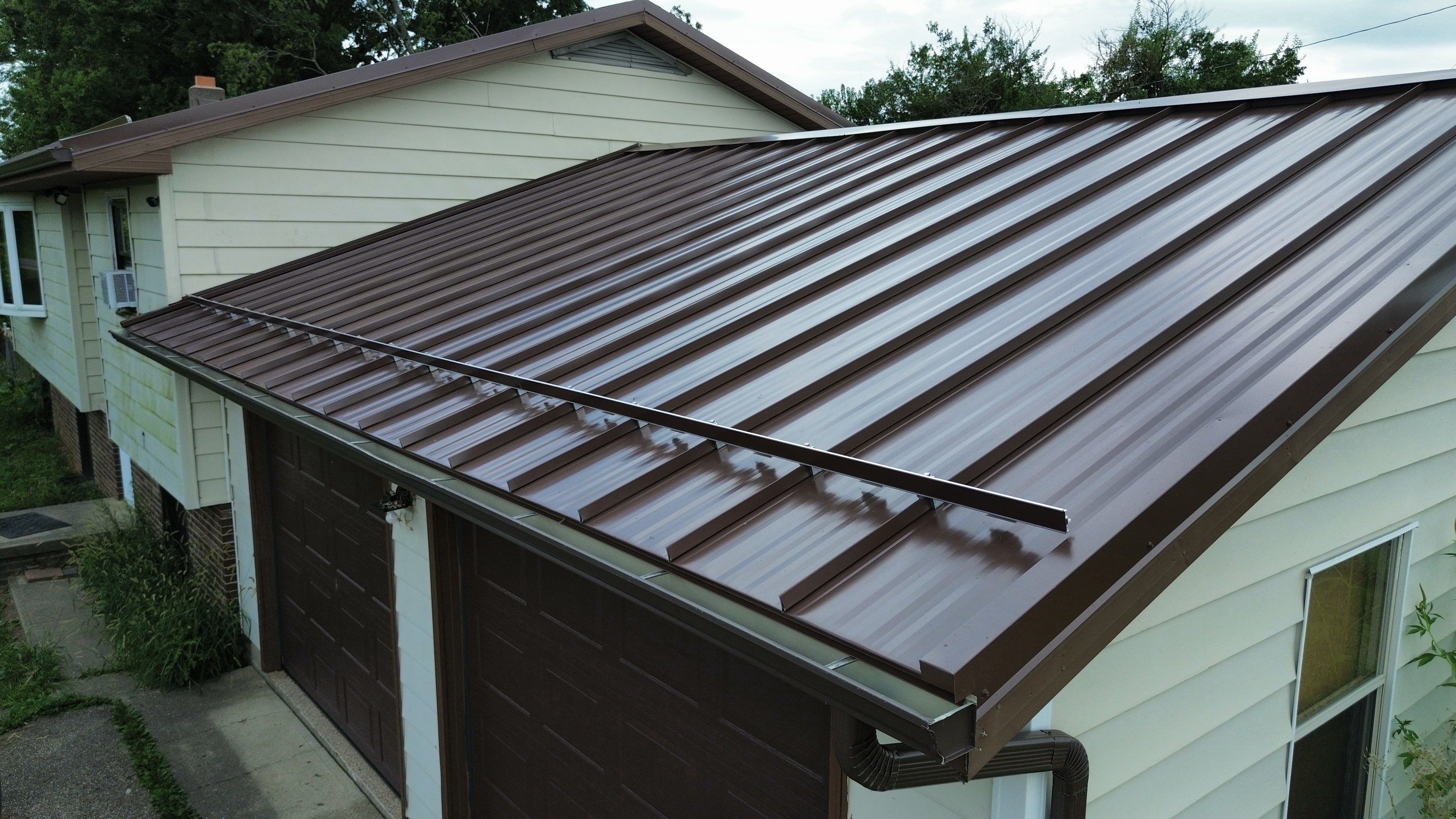 Standing Seam Metal Roof  by Know-A-Guy Roofing & Exteriors 