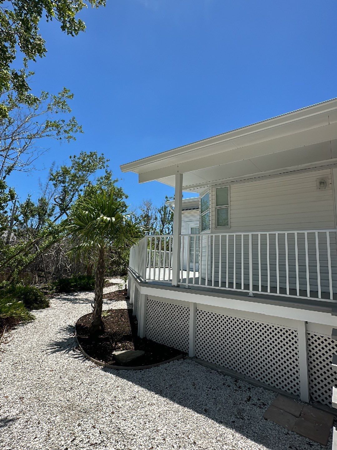 Downspout Installation using Charcoal Grey in Sanibel FL by Gutter Professors