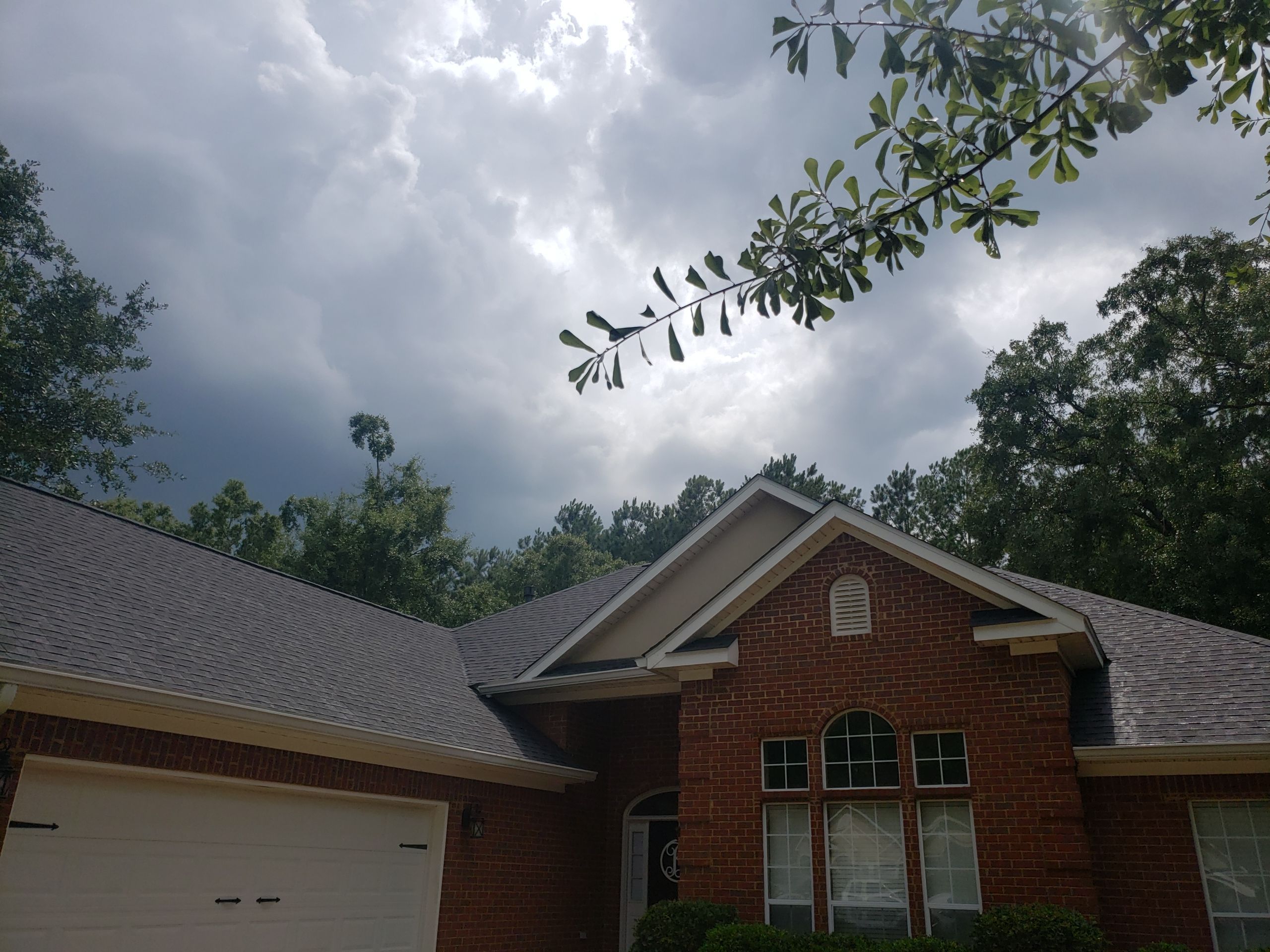 Residential Roofing Installation using Roof Replacement by American Roofing & Construction LLC