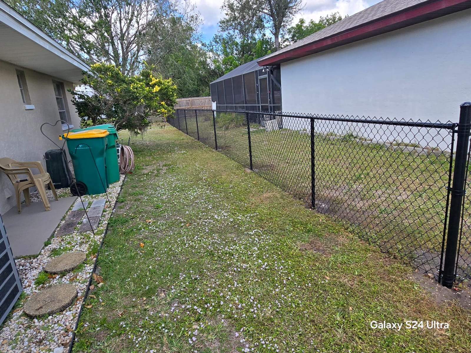 Black Chain Link Fence Installation for Port Charlotte Residence by True Fence LLC