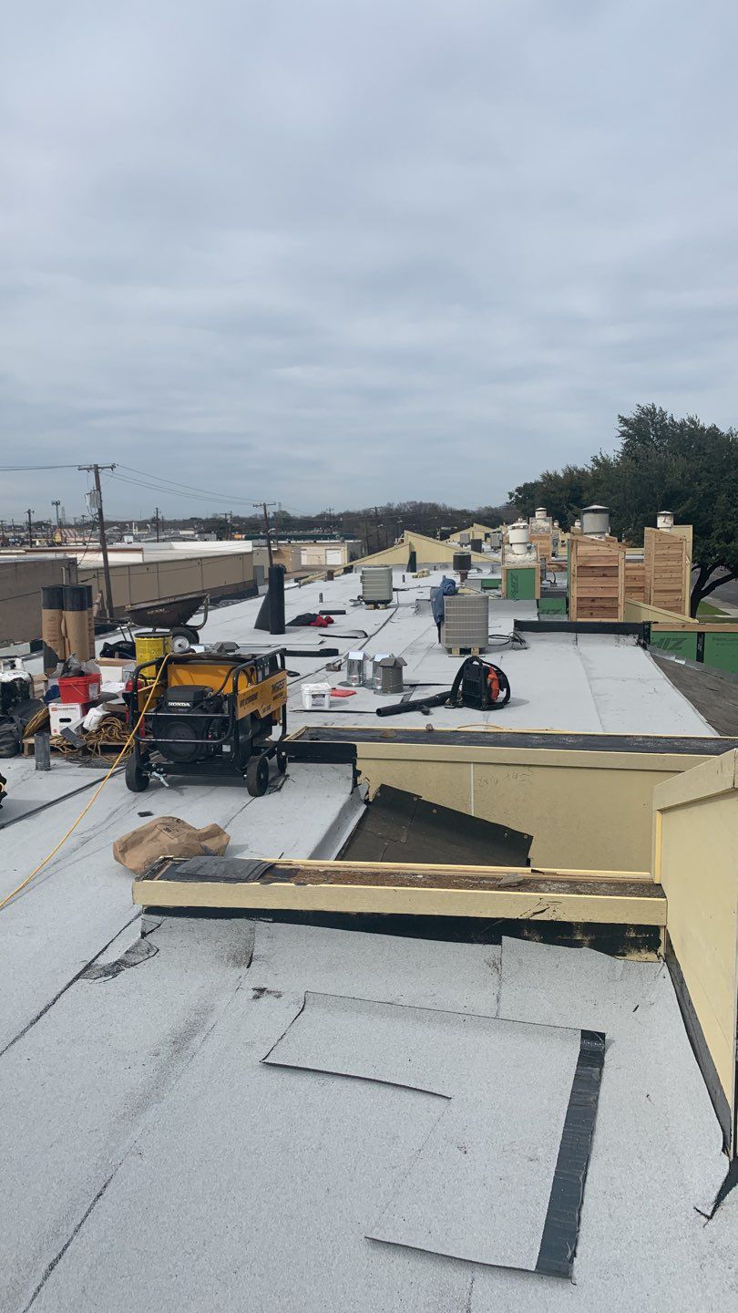 Apartment Roof Replacement by First Out Roofing 