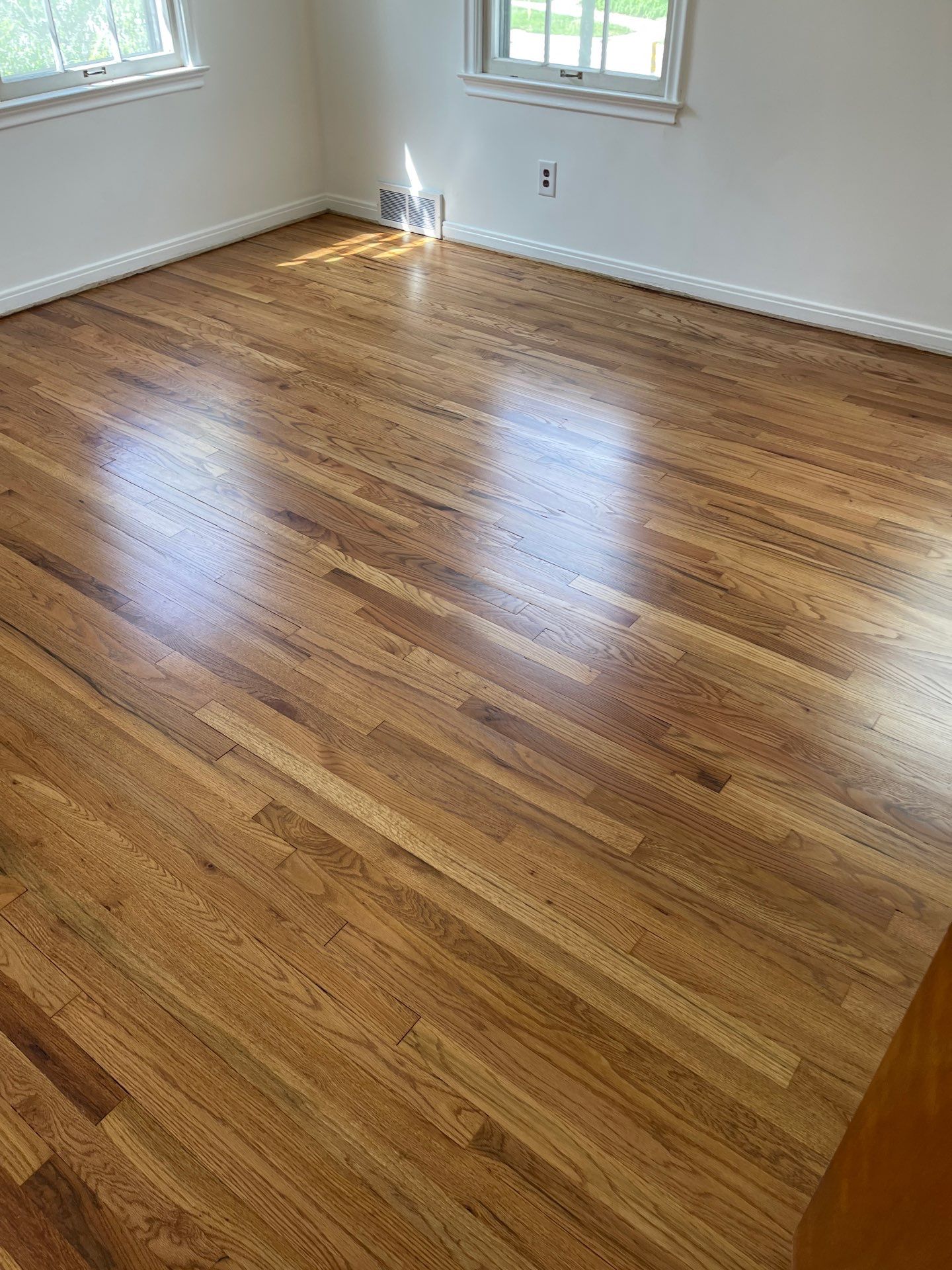 Hardwood flooring sanding using 2 1/4" Red oak flooring Golden Oak Stain by Ann Arbor Hardwoods