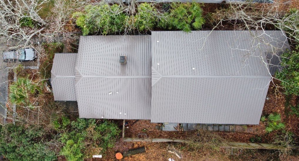 metal roof install by Nailed It Roofing & Remodeling LLC
