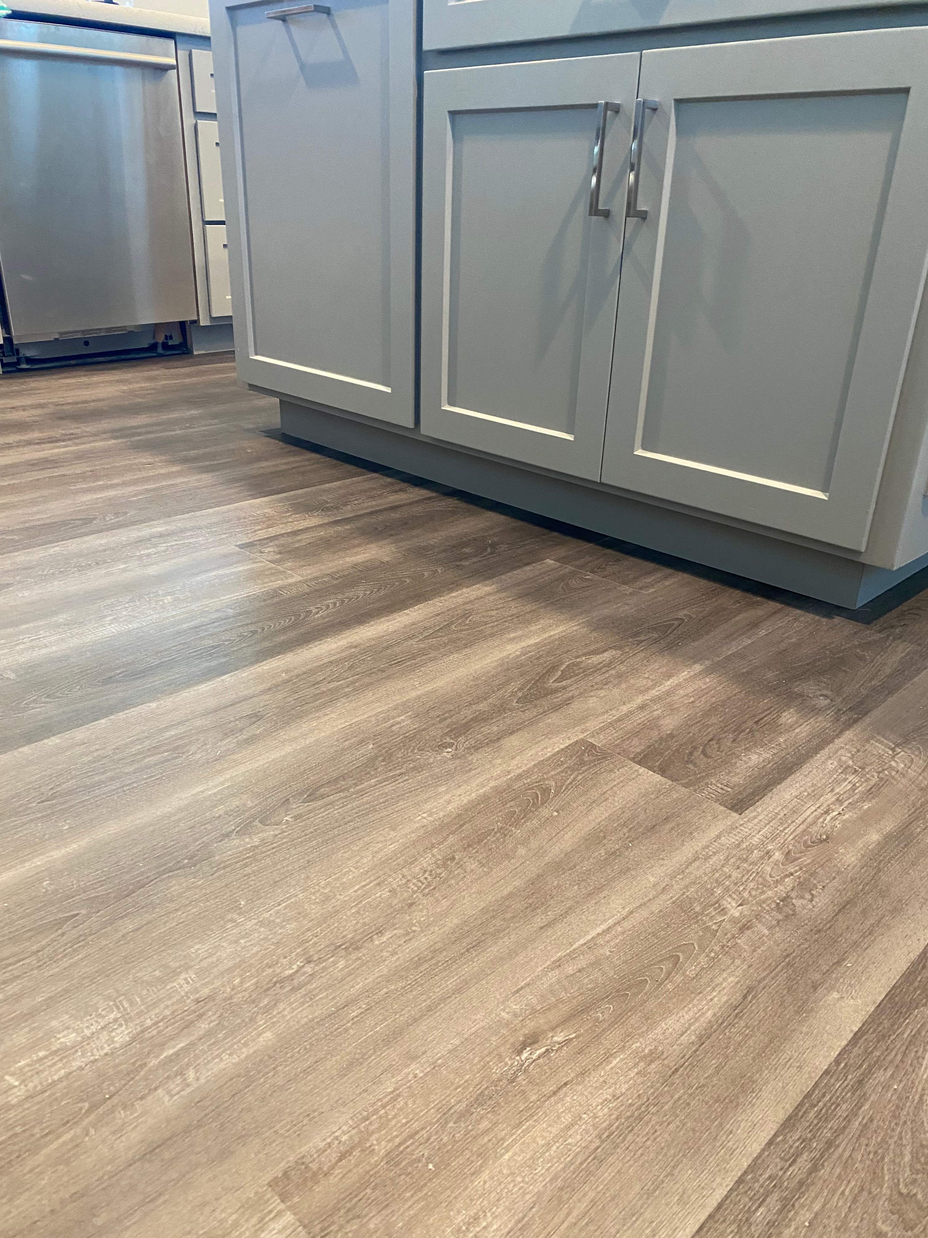 LVP Flooring for newly remodeled kitchen in Newcastle. by Footprints Floors South Sacramento