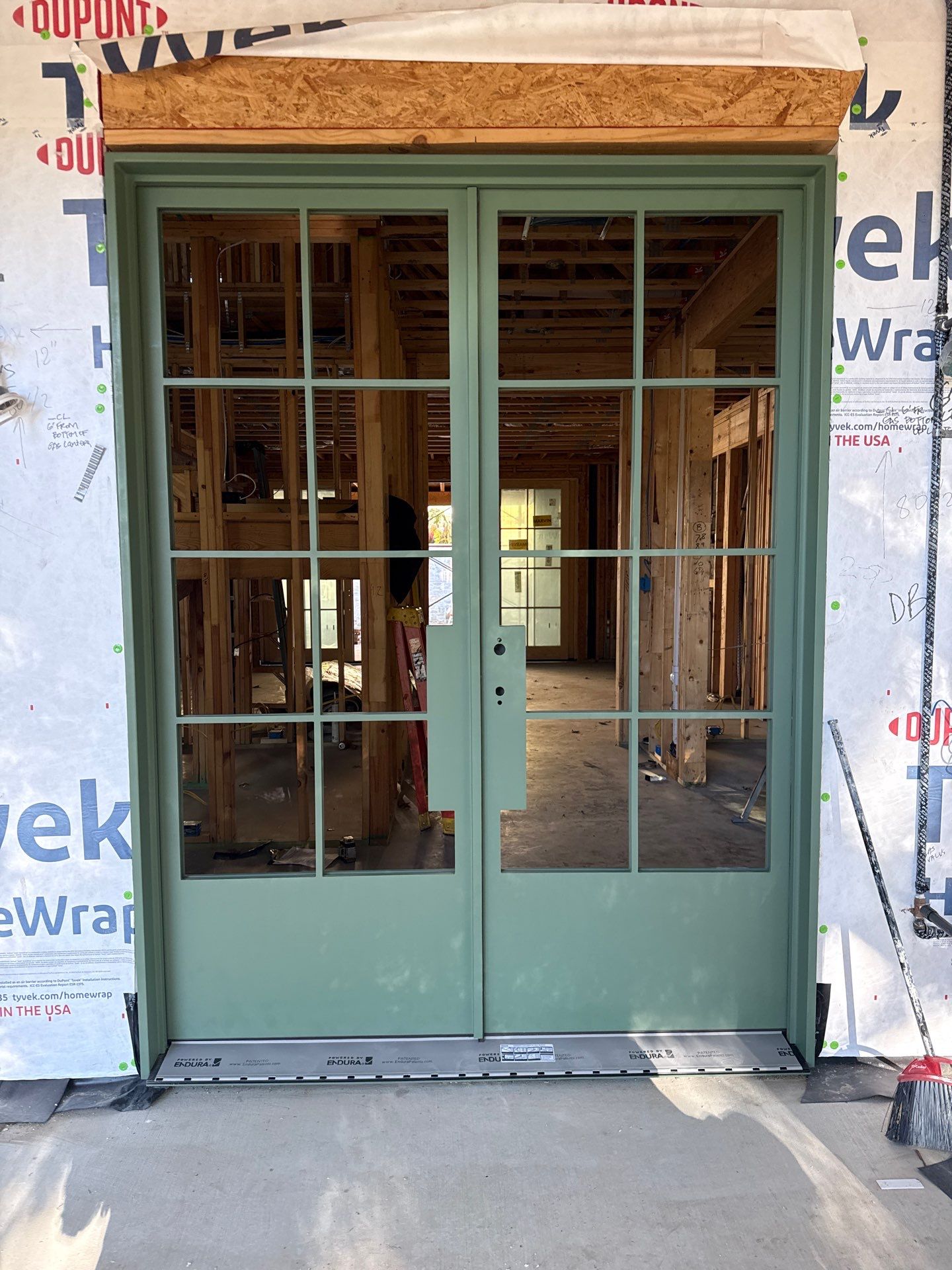 Steel Double Door Installation in Fort Worth in Sage Green by Solara Custom Living
