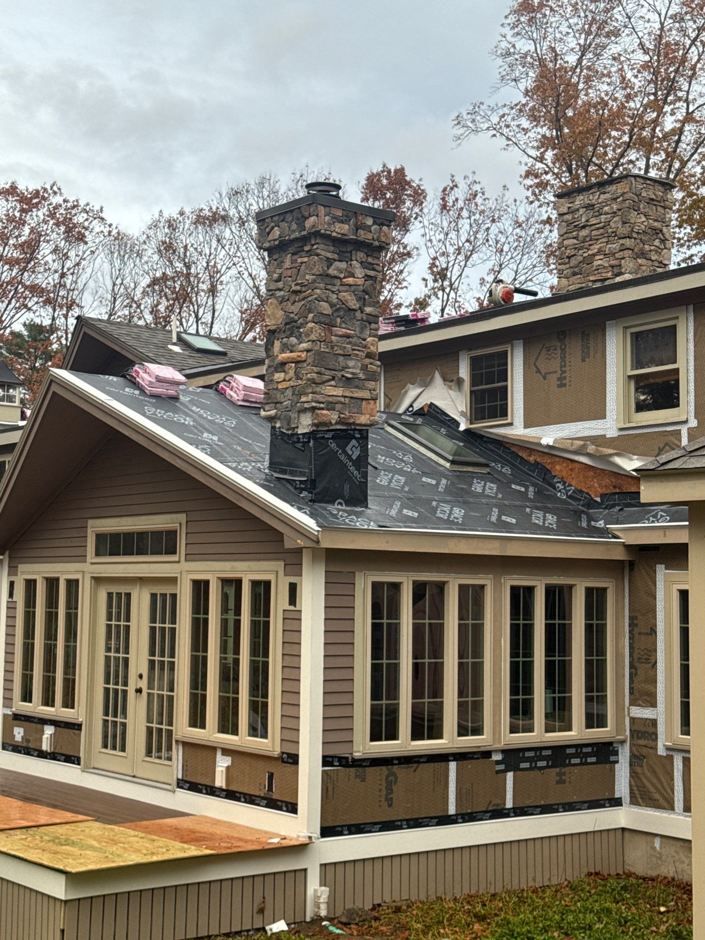 Complete House & Barn Roof with 13 Skylight Reflashing + EPDM Repairs by Mighty Dog Roofing of Greater Middlesex County