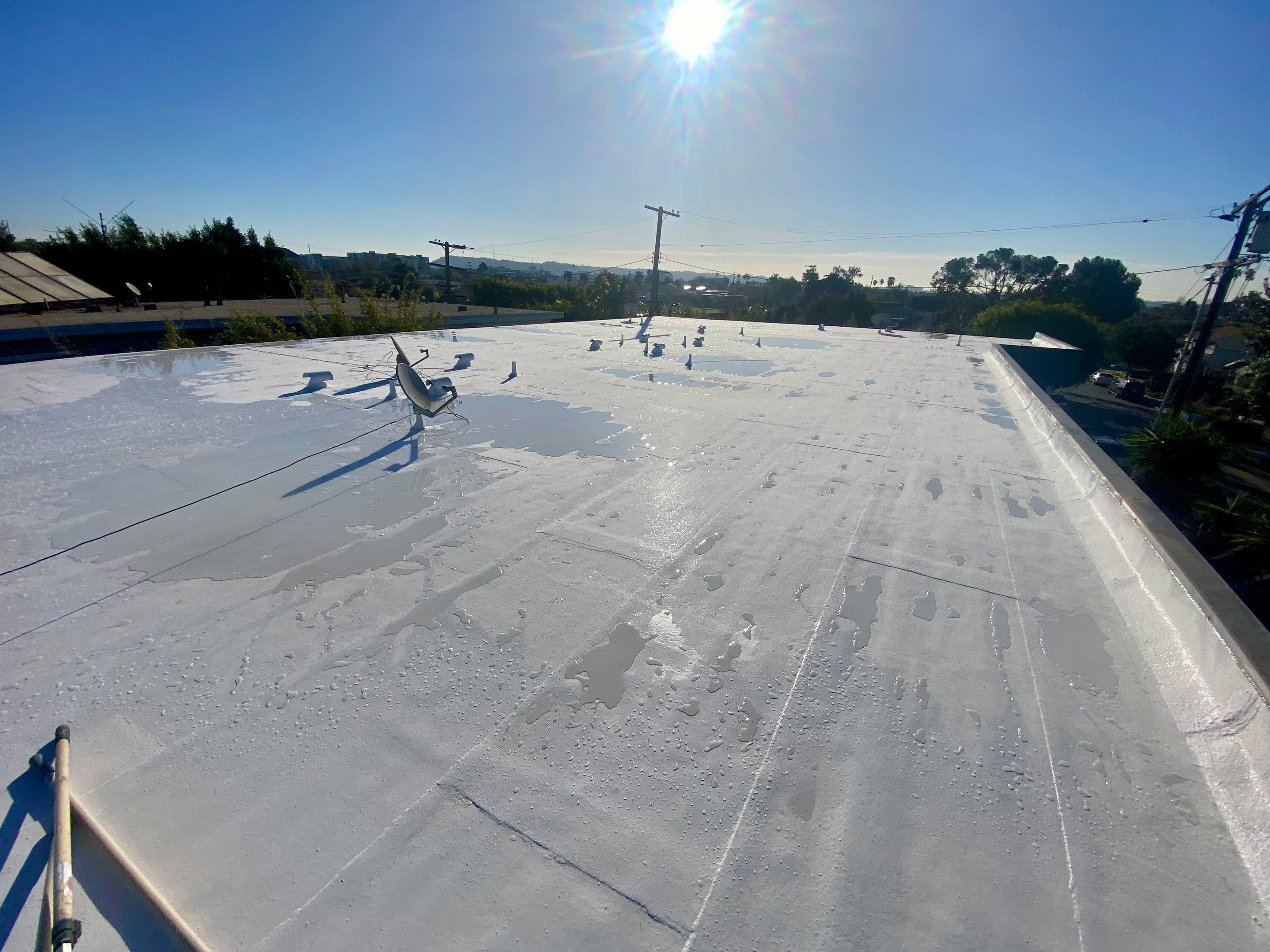Apartment Building - Silicone Installation using ASC's Silicone Membrane by Hull Brothers Roofing