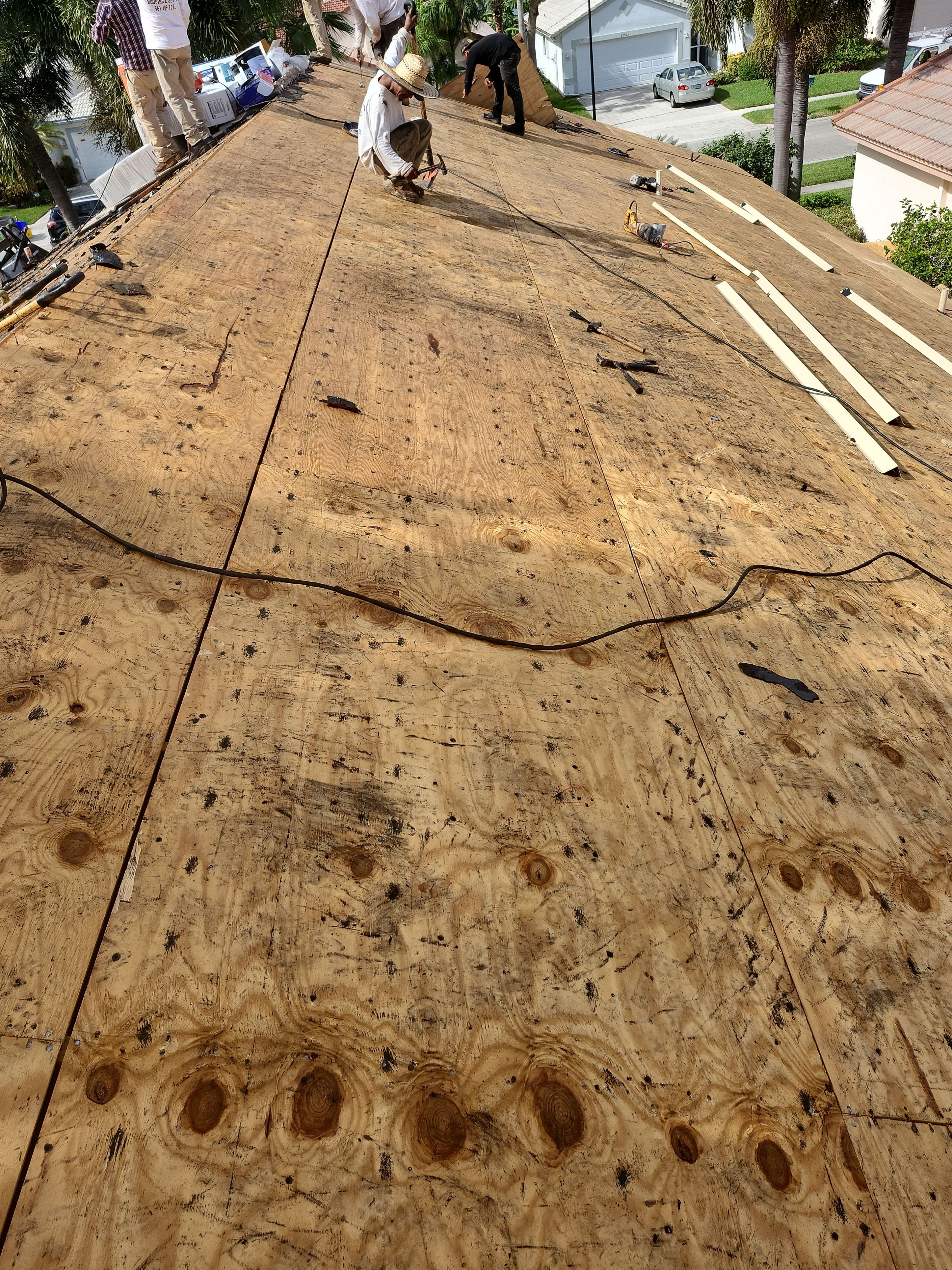 Concrete Tile Roof Replacement and Wood Decking Repair in Boca Raton by Aastro Roofing
