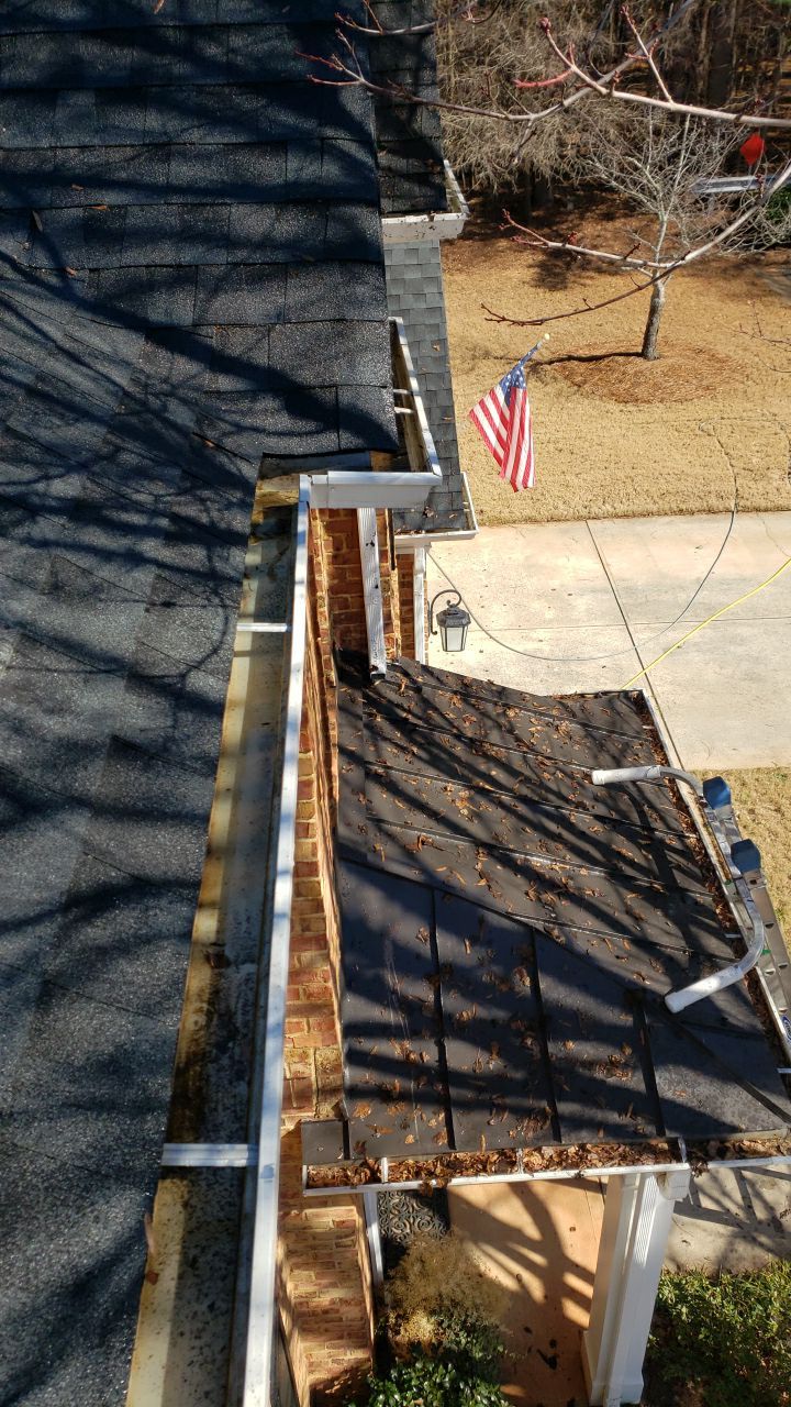Gutter Cleaning using water by Power Wash Masters LLC