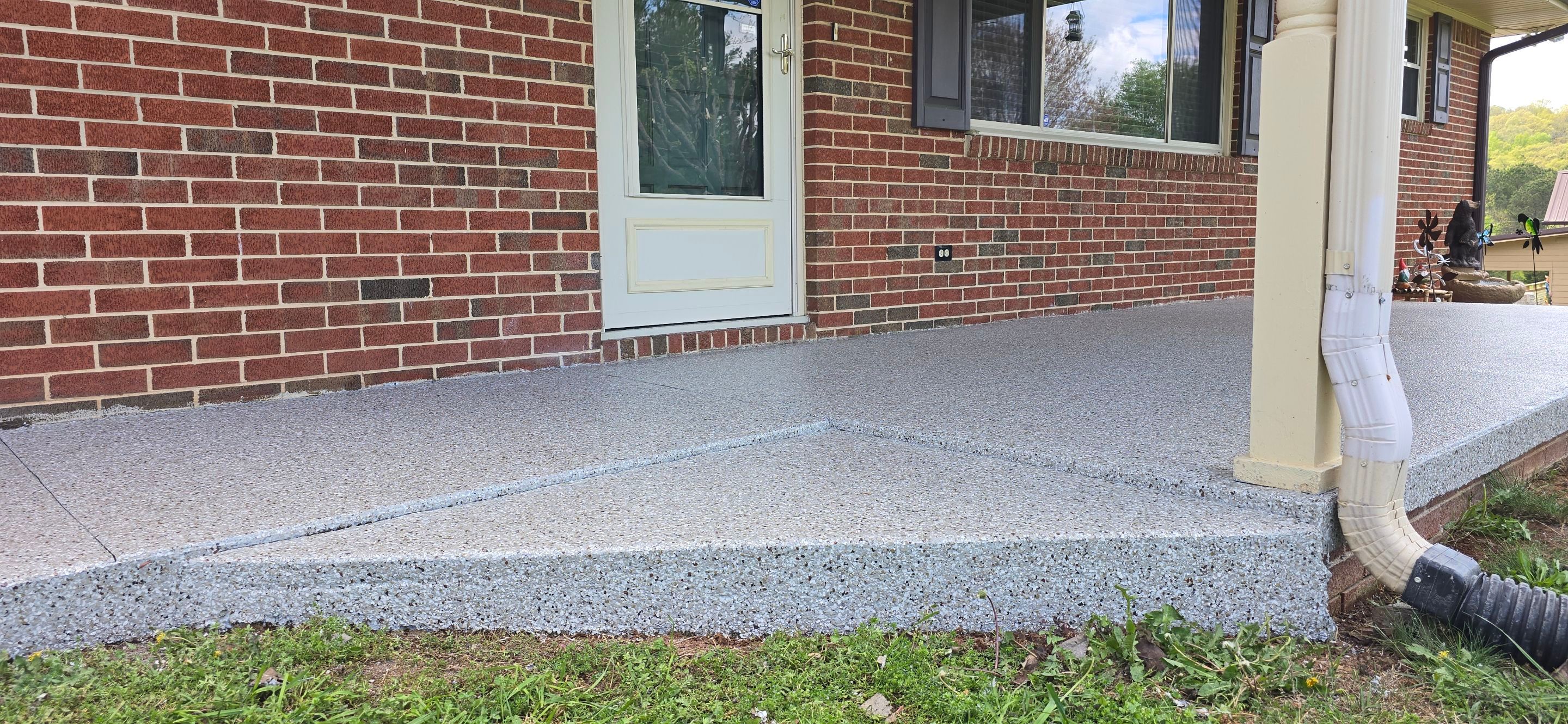 Back Patio using Creekbed by Elite Floor Solutions