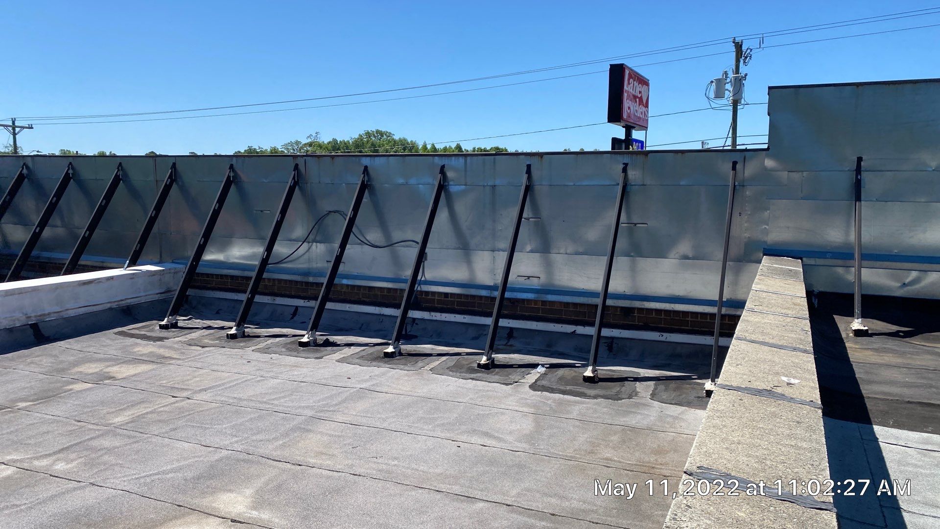 Commercial Roof Coating using Fiberseal basecoat and Silicon Topcoat by Just In Time Roofing and Restoration