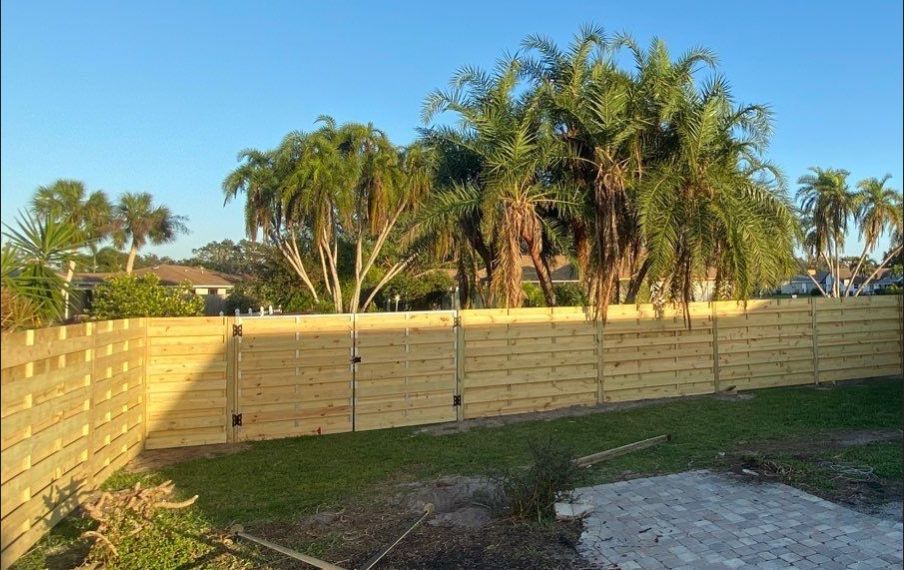 Wood Fence Installation using Shadowbox Wood Fence by Asap fence and gates, LLC