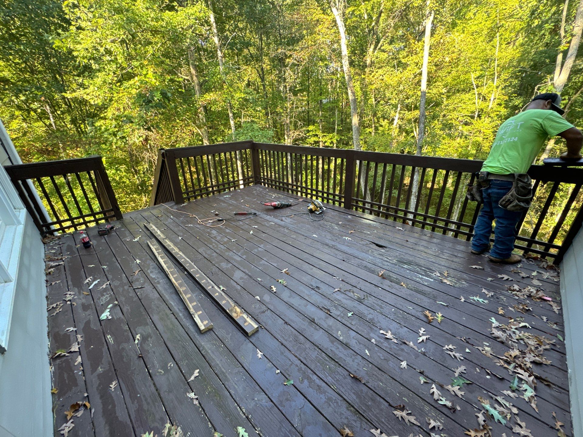 Elevated Deck Replacement with White Railings in Kennesaw by Swift Home Renovations 