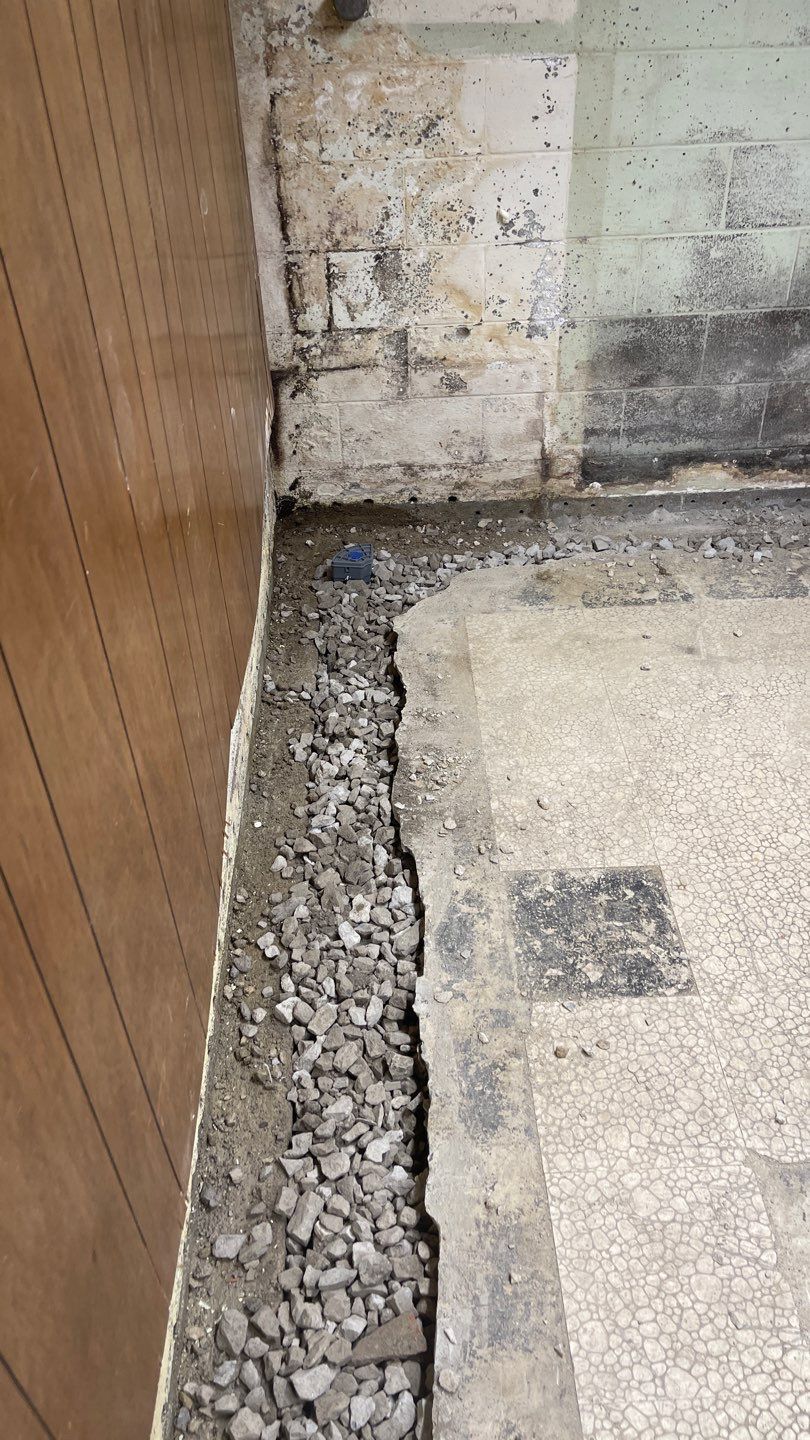 Interior Waterproofing Using GrateDrain™ Products by Toledo Basement Repair 
