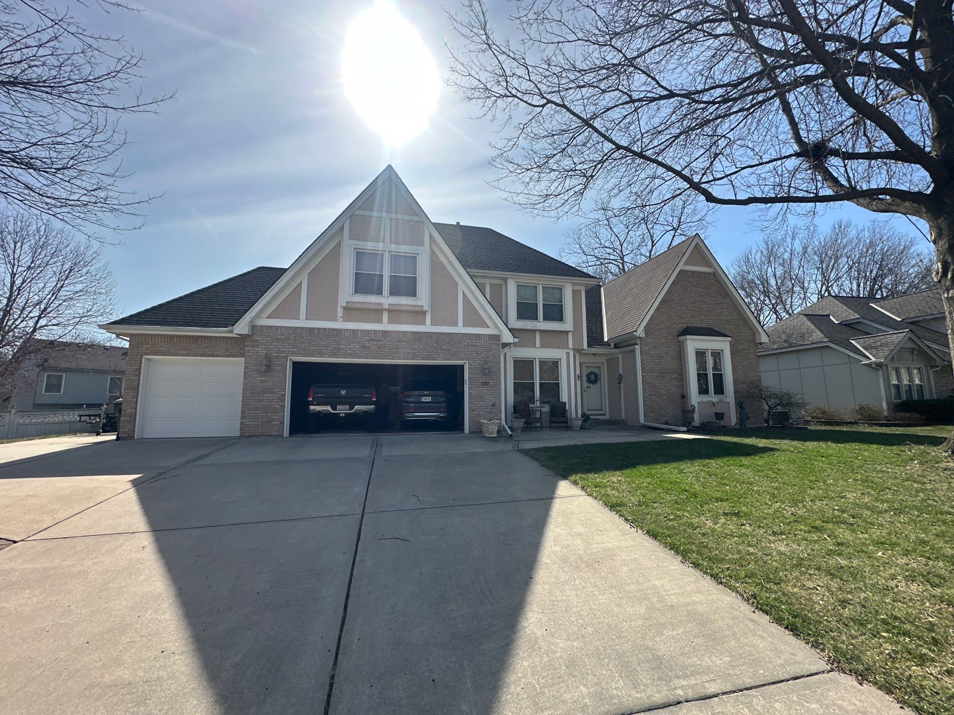 Comprehensive Roof Replacement and Skylight Installation in Kansas City by Liberty Roofing